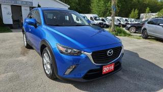 Low Mileage<br><br>2016 MAZDA CX-3 TOURING featuring Air Conditioning, Alloy Wheels, Backup Camera, Cruise Control, Heated Seats, Keyless Entry, Navigation System, Power Windows, Power Heated Side Mirrors w/Manual Folding, Fixed Rear Window w/Fixed Interval Wiper, Heated Wiper Park and Defroster, Light Tinted Glass Variable Intermittent Wipers, Fully Galvanized Steel Panels, Lip Spoiler and more.<br><br>Purchase price: $14,888 plus HST and LICENSING<br><br>Safety package is available for $799 and includes Ontario Certification, 3 month or 3000 km Lubrico warranty ($1000 per claim) and oil change.<br>If not certified, by OMVIC regulations this vehicle is being sold AS-lS and is not represented as being in road worthy condition, mechanically sound or maintained at any guaranteed level of quality. The vehicle may not be fit for use as a means of transportation and may require substantial repairs at the purchaser   s expense. It may not be possible to register the vehicle to be driven in its current condition.<br><br>CARFAX PROVIDED FOR EVERY VEHICLE<br><br>WARRANTY: Extended warranty with variety terms and coverages is available, please ask our representative for more details.<br>FINANCING: Regardless of your credit score, we are committed to assisting you in obtaining a customized car loan that suits your specific circumstances. Our goal is to help you enhance your credit score significantly by the time you complete your loan term. Our specialists are happy to assist you with all necessary information.<br>TRADE-IN OR SELL: Upgrade your ride by trading-in your vehicle and save on taxes, or Sell it to us, and get the best value for your current vehicle.<br><br>Smart Wheels Used Car Dealership     OMVIC Registered Dealer<br>642 Dunlop St West, Barrie, ON L4N 9M5<br>Phone: 705-721-1341 ext 201<br>Email: Info@swcarsales.ca<br>Web: www.swcarsales.ca<br>Terms and conditions may apply. Price and availability subject to change. Contact us for the latest information<br>