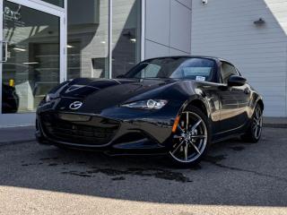 This 2017 Mazda MX-5 GT RF looks incredible in Jet Black Mica!Its powered by a 2.0 Liter 4 Cylinder engine that produces 181 horsepower while paired to a 6-Speed Manual transmission.Sporty sleek lines and alluring curves are prominent by impressive exterior features including gorgeous gloss black wheels, gloss black roof, gloss black mirrors, LED headlights taillights, and fog lights.Open the door to our GT to find a world of comfort and convenience with a power retractable hard-top, beige leather seating, heated front seats, a leather-wrapped heated steering wheel with mounted audio/cruise controls, Bluetooth hands-free phone capability, an impressive sound system with HD radio, a color screen with Mazda Connect and navigation, and an impressive sound system. Our Mazda gives you peace of mind with an array of safety features including stability/traction control, and more! Print this page and call us Now... We Know You Will Enjoy Your Test Drive Towards Ownership! We look forward to showing you why Go Mazda is the best place for all your automotive needs.Go Mazda is an AMVIC licensed business.Clean CarFax
