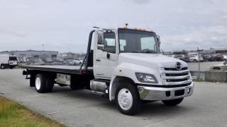 2018 Hino Conventional Cab Regular Cab Tow Tilt Deck with Rear Towing capacity Truck Diesel, 7.6L L6 DIESEL engine, 2 door, automatic, cruise control, air conditioning, AM/FM radio, CD player, power windows, PTO, white exterior, grey interior. Certificate and Decal Valid to May 2025 $117,510.00 plus $375 processing fee, $117,885.00 total payment obligation before taxes.  Listing report, warranty, contract commitment cancellation fee, financing available on approved credit (some limitations and exceptions may apply). All above specifications and information is considered to be accurate but is not guaranteed and no opinion or advice is given as to whether this item should be purchased. We do not allow test drives due to theft, fraud and acts of vandalism. Instead we provide the following benefits: Complimentary Warranty (with options to extend), Limited Money Back Satisfaction Guarantee on Fully Completed Contracts, Contract Commitment Cancellation, and an Open-Ended Sell-Back Option. Ask seller for details or call 604-522-REPO(7376) to confirm listing availability.