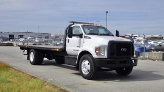 2018 Ford F-750 Regular Cab Tow Tilt Deck with Rear Towing capacity Truck Diesel, 6.7L V8 DIESEL engine., 2 door, automatic, 4X2, cruise control, air conditioning, AM/FM radio, winch, white exterior, grey interior. Measurements : Width is 8 foot 5 inches, Length is 22 Foot. ( All measurements are deemed to be correct but not guaranteed ) Certificate and Decal Valid to April 2025 $135,720.00 plus $375 processing fee, $136,095.00 total payment obligation before taxes.  Listing report, warranty, contract commitment cancellation fee, financing available on approved credit (some limitations and exceptions may apply). All above specifications and information is considered to be accurate but is not guaranteed and no opinion or advice is given as to whether this item should be purchased. We do not allow test drives due to theft, fraud and acts of vandalism. Instead we provide the following benefits: Complimentary Warranty (with options to extend), Limited Money Back Satisfaction Guarantee on Fully Completed Contracts, Contract Commitment Cancellation, and an Open-Ended Sell-Back Option. Ask seller for details or call 604-522-REPO(7376) to confirm listing availability.
