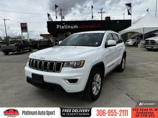 <b>Android Auto,  Apple CarPlay,  Heated Seats,  Remote Start,  Proximity Key!</b><br> <br>    If you want a midsize SUV that does a little of everything, the Jeep Grand Cherokee is a perfect candidate. This  2021 Jeep Grand Cherokee is for sale today. <br> <br>The Jeep Grand Cherokee is the most awarded SUV ever and for a very good reasons. With numerous best-in-class features and class-exclusive amenities, the 2021 Jeep Grand Cherokee offers drivers more than the competition. On the outside, it showcases the rugged capability to go off the beaten path while the interior offers technology and comfort beyond what youd expect in an SUV. This gorgeous Jeep Grand Cherokee is second to none when it comes to performance, safety, and style. This  SUV has 100,636 kms. Its  white in colour  . It has a 8 speed automatic transmission and is powered by a  293HP 3.6L V6 Cylinder Engine.  <br> <br> Our Grand Cherokees trim level is Laredo. This Grand Cherokee Laredo loads tons of off road capability into the perfect family SUV with towing equipment, aluminum wheels, a body colored grille and exterior accents, and fog lamps. Ride comfortable and connected with Uconnect 4, voice activation, Apple CarPlay, Android Auto, a heated leather steering wheel, heated seats, a proximity key, remote start, and a power liftgate. Ensure your family rides safe with blind spot monitoring, rear cross path detection, and a ParkView rear backup camera. 
 This vehicle has been upgraded with the following features: Android Auto,  Apple Carplay,  Heated Seats,  Remote Start,  Proximity Key,  Power Liftgate,  Heated Steering Wheel
. <br> To view the original window sticker for this vehicle view this <a href=http://www.chrysler.com/hostd/windowsticker/getWindowStickerPdf.do?vin=1C4RJFAG3MC639254 target=_blank>http://www.chrysler.com/hostd/windowsticker/getWindowStickerPdf.do?vin=1C4RJFAG3MC639254</a>. <br/><br> <br>To apply right now for financing use this link : <a href=https://www.platinumautosport.com/credit-application/ target=_blank>https://www.platinumautosport.com/credit-application/</a><br><br> <br/><br> Buy this vehicle now for the lowest bi-weekly payment of <b>$199.84</b> with $0 down for 96 months @ 5.99% APR O.A.C. ( Plus applicable taxes -  Plus applicable fees   ).  See dealer for details. <br> <br><br> We know that you have high expectations, and as car dealers, we enjoy the challenge of meeting and exceeding those standards each and every time. Allow us to demonstrate our commitment to excellence! </br>

<br> As your one stop shop for quality pre owned vehicles and hassle free auto financing in Saskatoon, we provide the following offers & incentives for our valued clients in Saskatchewan, Alberta & Manitoba. </br> o~o