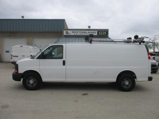 <p>4.8,auto,air,radio.  No frills well equipped cargo van ideal for construction use. Includes ladder rack, plus an ample amount of  rear shelving and cabinets. Safetied with 299,500kms.  Powertrain warranty avail. $11,500. Taxes extra. Motorland Enterprises. (204)895-7442 or text Cam @ (204)290-1908 for an appt. to view. Dealer permit #9964.</p>