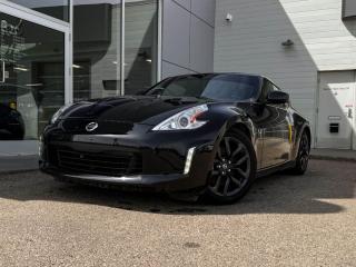 2017 Nissan 370Z Touring shown off in Black! It has black wheels, dual exhaust, LED headlights/fog lights, all weather mats, a leather-wrapped steering wheel with mounted audio/cruise controls, a custom shift knob for the 6-Speed manual transmission, and so much more. Full photos and description coming soon!Clean CarFax