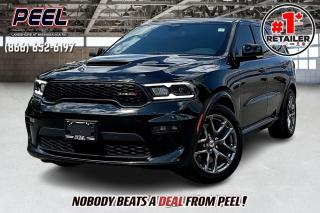 2022 Dodge Durango R/T AWD | 5.7L V8 | Diamond Black | Tow n Go Group | Heated & Ventilated Nappa Leather Seats | Power Sunroof | 6 Passenger | Second-row Captain Chairs w/ Console & Arm Rest | Uconnect 5 10.1" Display w/ Navigation | Wireless Apple CarPlay & Android Auto | Black Brembo Brake Calipers | High Performance Exhaust | Wireless Charging | Heated Steering Wheel | Remote Start | Power Liftgate | Parking Sensors | Blind Spot Monitoring

One Owner Clean Carfax

Introducing the 2022 Dodge Durango R/T AWD in striking Diamond Black. This powerful SUV boasts a 5.7L V8 engine and is equipped with the Tow n Go Group, ensuring impressive towing capabilities. Inside, enjoy luxurious heated and ventilated Nappa leather seats, a power sunroof, and a spacious six-passenger layout featuring second-row captain chairs with a console and armrest. Stay connected with the Uconnect 5 system on a 10.1" display, complete with navigation and wireless Apple CarPlay & Android Auto. Enhanced with black Brembo brake calipers, high-performance exhaust, wireless charging, a heated steering wheel, remote start, power liftgate, parking sensors, and blind spot monitoring, this Durango offers a perfect blend of performance, luxury, and advanced technology.
______________________________________________________

Engage & Explore with Peel Chrysler: Whether youre inquiring about our latest offers or seeking guidance, 1-866-652-6197 connects you directly. Dive deeper online or connect with our team to navigate your automotive journey seamlessly.

WE TAKE ALL TRADES & CREDIT. WE SHIP ANYWHERE IN CANADA! OUR TEAM IS READY TO SERVE YOU 7 DAYS! COME SEE WHY NOBODY BEATS A DEAL FROM PEEL! Your Source for ALL make and models used cars and trucks
______________________________________________________

*FREE CarFax (click the link above to check it out at no cost to you!)*

*FULLY CERTIFIED! (Have you seen some of these other dealers stating in their advertisements that certification is an additional fee? NOT HERE! Our certification is already included in our low sale prices to save you more!)

______________________________________________________

Peel Chrysler  A Trusted Destination: Based in Port Credit, Ontario, we proudly serve customers from all corners of Ontario and Canada including Toronto, Oakville, North York, Richmond Hill, Ajax, Hamilton, Niagara Falls, Brampton, Thornhill, Scarborough, Vaughan, London, Windsor, Cambridge, Kitchener, Waterloo, Brantford, Sarnia, Pickering, Huntsville, Milton, Woodbridge, Maple, Aurora, Newmarket, Orangeville, Georgetown, Stouffville, Markham, North Bay, Sudbury, Barrie, Sault Ste. Marie, Parry Sound, Bracebridge, Gravenhurst, Oshawa, Ajax, Kingston, Innisfil and surrounding areas. On our website www.peelchrysler.com, you will find a vast selection of new vehicles including the new and used Ram 1500, 2500 and 3500. Chrysler Grand Caravan, Chrysler Pacifica, Jeep Cherokee, Wrangler and more. All vehicles are priced to sell. We deliver throughout Canada. website or call us 1-866-652-6197. 

Your Journey, Our Commitment: Beyond the transaction, Peel Chrysler prioritizes your satisfaction. While many of our pre-owned vehicles come equipped with two keys, variations might occur based on trade-ins. Regardless, our commitment to quality and service remains steadfast. Experience unmatched convenience with our nationwide delivery options. All advertised prices are for cash sale only. Optional Finance and Lease terms are available. A Loan Processing Fee of $499 may apply to facilitate selected Finance or Lease options. If opting to trade an encumbered vehicle towards a purchase and require Peel Chrysler to facilitate a lien payout on your behalf, a Lien Payout Fee of $299 may apply. Contact us for details. Peel Chrysler Pre-Owned Vehicles come standard with only one key.