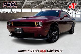 2020 Dodge Challenger GT AWD | 3.6L V6 | Octane Red Pearl | LOADED | Blacktop Package | Heated & Ventilated Alcantara Seats | Power Sunroof | Uconnect 4C 8.4" Touchscreen w/ Navigation | Apple CarPlay & Android Auto | 9 Speaker Alpine Premium Audio System | Adaptive Cruise Control | Forward Collision Warning | Blind Spot Monitoring | Heated Steering Wheel | Remote Start | Cold Air Intake

Clean Carfax No Accidents

Unleash your driving passion with the 2020 Dodge Challenger GT AWD, radiating in a captivating Octane Red Pearl. Powered by a 3.6L V6 engine, this muscle car delivers both performance and all-weather capability. The Blacktop Package adds a striking edge, complemented by heated and ventilated Alcantara seats and a power sunroof. Stay connected with the Uconnect 4C system featuring an 8.4" touchscreen, navigation, Apple CarPlay, and Android Auto. The 9-speaker Alpine Premium Audio System ensures an immersive sound experience. Advanced safety features like adaptive cruise control, forward collision warning, and blind spot monitoring provide peace of mind. Additional conveniences include a heated steering wheel and remote start. Loaded with premium features, this Challenger GT AWD offers an unbeatable blend of style, performance, and technology.
______________________________________________________

Engage & Explore with Peel Chrysler: Whether youre inquiring about our latest offers or seeking guidance, 1-866-652-6197 connects you directly. Dive deeper online or connect with our team to navigate your automotive journey seamlessly.

WE TAKE ALL TRADES & CREDIT. WE SHIP ANYWHERE IN CANADA! OUR TEAM IS READY TO SERVE YOU 7 DAYS! COME SEE WHY NOBODY BEATS A DEAL FROM PEEL! Your Source for ALL make and models used cars and trucks
______________________________________________________

*FREE CarFax (click the link above to check it out at no cost to you!)*

*FULLY CERTIFIED! (Have you seen some of these other dealers stating in their advertisements that certification is an additional fee? NOT HERE! Our certification is already included in our low sale prices to save you more!)

______________________________________________________

Peel Chrysler  A Trusted Destination: Based in Port Credit, Ontario, we proudly serve customers from all corners of Ontario and Canada including Toronto, Oakville, North York, Richmond Hill, Ajax, Hamilton, Niagara Falls, Brampton, Thornhill, Scarborough, Vaughan, London, Windsor, Cambridge, Kitchener, Waterloo, Brantford, Sarnia, Pickering, Huntsville, Milton, Woodbridge, Maple, Aurora, Newmarket, Orangeville, Georgetown, Stouffville, Markham, North Bay, Sudbury, Barrie, Sault Ste. Marie, Parry Sound, Bracebridge, Gravenhurst, Oshawa, Ajax, Kingston, Innisfil and surrounding areas. On our website www.peelchrysler.com, you will find a vast selection of new vehicles including the new and used Ram 1500, 2500 and 3500. Chrysler Grand Caravan, Chrysler Pacifica, Jeep Cherokee, Wrangler and more. All vehicles are priced to sell. We deliver throughout Canada. website or call us 1-866-652-6197. 

Your Journey, Our Commitment: Beyond the transaction, Peel Chrysler prioritizes your satisfaction. While many of our pre-owned vehicles come equipped with two keys, variations might occur based on trade-ins. Regardless, our commitment to quality and service remains steadfast. Experience unmatched convenience with our nationwide delivery options. All advertised prices are for cash sale only. Optional Finance and Lease terms are available. A Loan Processing Fee of $499 may apply to facilitate selected Finance or Lease options. If opting to trade an encumbered vehicle towards a purchase and require Peel Chrysler to facilitate a lien payout on your behalf, a Lien Payout Fee of $299 may apply. Contact us for details. Peel Chrysler Pre-Owned Vehicles come standard with only one key.