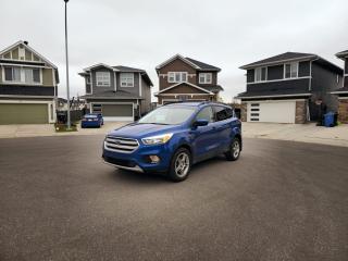 <p>2018 Ford Escape with under 110,000 km. This versatile SUV is perfect for families or first-time buyers, offering a reliable and comfortable ride. With its spacious interior, youll have plenty of room for passengers and cargo, making it ideal for both daily commutes and weekend getaways.</p><p>Equipped with advanced safety features and a user-friendly infotainment system, the 2018 Escape ensures peace of mind and entertainment for all passengers. Its all-wheel-drive capability makes it a great choice for winter driving, providing excellent traction and stability on snowy or icy roads. In the summer, enjoy the smooth and efficient performance that makes long drives a pleasure.</p><p>This Ford Escape is well-maintained and in excellent condition, ready to serve you through all seasons with confidence and ease.</p>