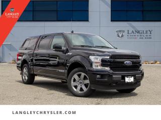 <p><strong><span style=font-family:Arial; font-size:18px;>Canopy | Navigation | Pano-Sunroof | Leather - Experience luxury and utility combined in this pre-owned 2018 Ford F-150 Lariat, a true marvel on wheels..</span></strong></p> <p><span style=font-family:Arial; font-size:18px;>Are you ready to elevate your driving experience? This stunning black beauty, with only 49,808 km on the odometer, is the epitome of sophistication and power.. The 2018 Ford F-150 Lariat is not just a pickup; its a statement of style and performance.. The exterior black finish coupled with a matching black leather interior exudes a sleek and commanding presence on the road..</span></p> <p><span style=font-family:Arial; font-size:18px;>Under the hood, a robust 3.0L 6-cylinder engine paired with a 10-speed automatic transmission promises effortless power and smooth handling.. Whether youre navigating city streets or cruising down the highway, this F-150 delivers a ride quality that is second to none.. Did you know that the Ford F-150 has been Americas best-selling truck for over four decades? This truck continues that legacy with a suite of impressive features designed to make every journey more enjoyable..</span></p> <p><span style=font-family:Arial; font-size:18px;>Imagine yourself behind the wheel, adjusting the pedals to your perfect driving position, using the navigation system to find the quickest route, and enjoying your favorite tunes on the CD player.. The panoramic sunroof lets in natural light, enhancing the luxurious feel of the leather-upholstered interior.. The ventilation in the front seats ensures you stay comfortable no matter the weather..</span></p> <p><span style=font-family:Arial; font-size:18px;>Safety is paramount with dual front and side impact airbags, electronic stability, traction control, ABS brakes, and a rearview camera to assist with parking.. The F-150 Lariat also boasts features like auto-dimming mirrors, automatic temperature control, and a security system to ensure a comfortable and secure ride.. For those who demand more from their vehicle, this SuperCrew cab offers ample space for passengers and cargo..</span></p> <p><span style=font-family:Arial; font-size:18px;>The split-folding rear seat, rear beverage holders, and various storage compartments make it an ideal choice for family trips or weekend adventures.. Plus, with a trailer hitch receiver, youre all set for towing needs.. Dont just love your car, love buying it! At Langley Chrysler, we aim to make your purchasing experience as enjoyable as the ride itself..</span></p> <p><span style=font-family:Arial; font-size:18px;>Visit us today to see why this 2018 Ford F-150 Lariat stands out from the competition.. Take the first step toward owning this exceptional pickup today.. Your dream truck awaits its next adventure!.</span></p>Documentation Fee $968, Finance Placement $628, Safety & Convenience Warranty $699

<p>*All prices plus applicable taxes, applicable environmental recovery charges, documentation of $599 and full tank of fuel surcharge of $76 if a full tank is chosen. <br />Other protection items available that are not included in the above price:<br />Tire & Rim Protection and Key fob insurance starting from $599<br />Service contracts (extended warranties) for coverage up to 7 years and 200,000 kms starting from $599<br />Custom vehicle accessory packages, mudflaps and deflectors, tire and rim packages, lift kits, exhaust kits and tonneau covers, canopies and much more that can be added to your payment at time of purchase<br />Undercoating, rust modules, and full protection packages starting from $199<br />Financing Fee of $500 when applicable<br />Flexible life, disability and critical illness insurances to protect portions of or the entire length of vehicle loan</p>