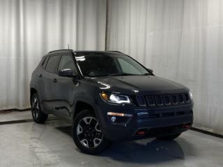 Fully Inspected, ALL Work Complete and Included in Price! Call Us For More Info at 587-409-5859 



Call Us For More Info at 587-409-5859</p>  <p>The 2018 Jeep Compass Trailhawk 4X4 is an adventurous SUV designed for those who seek both urban sophistication and off-road prowess. This versatile vehicle boasts a rugged 2.4L I4 MultiAir engine paired with a smooth 9-speed automatic transmission, delivering a robust 180 horsepower. Its Trail Rated® 4X4 system ensures superior traction, ground clearance, maneuverability, articulation, and water fording capabilities, making it perfect for tackling any terrain.</p>  <p>Inside, the Compass Trailhawk offers a spacious and comfortable cabin with premium cloth and leather-trimmed seats, and a user-friendly Uconnect® infotainment system with a 7-inch touchscreen, Apple CarPlay®, and Android Auto integration. Advanced safety features like blind-spot monitoring, rear cross-path detection, and a ParkView® rear backup camera provide peace of mind on every journey.</p>  <p>The exterior is equally impressive, featuring bold styling with a distinctive black hood decal, 17-inch off-road aluminum wheels, and red tow hooks that underscore its rugged appeal. The 2018 Jeep Compass Trailhawk 4X4 is the perfect blend of capability, comfort, and style, ready to conquer city streets and backcountry trails alike. 





 Call 587-409-5859 for more info or to schedule an appointment! Listed Pricing is valid for 72 hours. Financing is available. Please see dealer for term availability and interest rates. AMVIC Licensed Business.