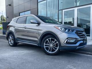 VENTILATED SEATS, PREMIUM AUDIO INFINITY, REMOTE START 
<P>
Introducing the 2018 Hyundai Santa Fe Limited, where premium features meet outstanding performance. This midsize SUV is designed for those who value luxury, versatility, and reliability in every drive. 
<P>
Key Features: 
<P>
1. Elegant and Bold Design: 
<P>
Sophisticated Exterior: Eye-catching front grille, sleek lines, and LED daytime running lights for a refined look. 
<P>
Stylish Details: Chrome accents, 19-inch alloy wheels, and a panoramic sunroof enhance its premium appeal. 
<P>
2. Powerful Performance: 
<P>
Robust Engine: 3.3L V6 engine delivering 290 horsepower for a smooth and powerful driving experience. 
<P>
Towing Capacity: Impressive towing capacity of up to 5,000 pounds, perfect for hauling trailers or boats. 
<P>
3. Luxurious Interior: 
<P>
Premium Seating: Leather-trimmed seats with power-adjustable front seats, heated and ventilated for maximum comfort. 
<P>
Spacious Cabin: Ample room for up to seven passengers, with a versatile second and third-row seating configuration. 
<P>
4. Advanced Technology: 
<P>
Infotainment System: 8-inch touchscreen with navigation, Apple CarPlay, Android Auto, and Infinity® premium audio for an immersive experience. 
<P>
Driver Information: Clear and customizable digital instrument cluster to keep essential information at your fingertips. 
<P>
Smart Features: Proximity key with push-button start, hands-free smart liftgate, and Blue Link® connected car services. 
<P>
5. Comprehensive Safety: 
<P>
Advanced Safety Systems: Includes Forward Collision-Avoidance Assist, Blind-Spot Detection, Rear Cross-Traffic Alert, and Lane Departure Warning. 
<P>
Parking Assistance: Rearview camera with dynamic guidelines and Rear Parking Sensors for easy maneuvering. 
<P>
Why Choose the 2018 Hyundai Santa Fe Limited? 
<P>
The 2018 Santa Fe Limited offers a perfect combination of luxury, technology, and performance. Its elegant design, powerful engine, and advanced features make it an ideal choice for families and adventurers alike. 
<P>
All Abbotsford Hyundai pre-owned vehicles come complete with remaining Manufacturers Warranty plus a vehicle safety report and a CarFax history report. Abbotsford Hyundai is a BBB accredited pre-owned car dealership, serving the Fraser Valley and our friends in Surrey, Langley and surrounding Lower Mainland areas. We are your Friendly Fraser Valley car dealer. We are located at 30250 Automall Drive in Abbotsford. Call or email us to schedule a test drive. 
<P>
*All Sales are subject to Taxes, $699 Doc fee and $87 Fuel Surcharge.