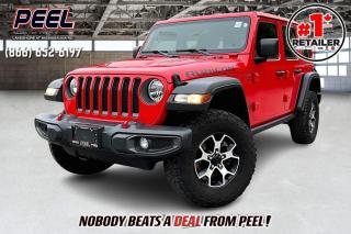 2022 Jeep Wrangler 4-Door Rubicon 4X4 | 2.0L I-4 Turbo | Firecracker Red | Cloth Bucket Seats | Remote Start | Uconnect 4C 8.4" Touchscreen w/ Navigation | Alpine Premium Audio System | Apple CarPlay & Android Auto | Black Freedom 3-piece Hard Top

Clean Carfax | HAND SELECTED FORMER DAILY RENTAL

Introducing the 2022 Jeep Wrangler 4-Door Rubicon 4X4, an off-road beast with unmatched capability and style. Sporting a vibrant Firecracker Red exterior, this rugged machine is powered by a 2.0L I-4 Turbo engine. Inside, youll find durable cloth bucket seats and the convenience of remote start. Stay connected with the Uconnect 4C system, featuring an 8.4" touchscreen with navigation, Apple CarPlay, and Android Auto. Enjoy an immersive audio experience with the Alpine Premium Audio System. The versatile Black Freedom 3-piece hard top adds to its rugged appeal. With a clean Carfax and hand-selected from a former daily rental fleet, this Rubicon is ready for any adventure, combining legendary Jeep performance with modern technology.
______________________________________________________

Engage & Explore with Peel Chrysler: Whether youre inquiring about our latest offers or seeking guidance, 1-866-652-6197 connects you directly. Dive deeper online or connect with our team to navigate your automotive journey seamlessly.

WE TAKE ALL TRADES & CREDIT. WE SHIP ANYWHERE IN CANADA! OUR TEAM IS READY TO SERVE YOU 7 DAYS! COME SEE WHY NOBODY BEATS A DEAL FROM PEEL! Your Source for ALL make and models used cars and trucks
______________________________________________________

*FREE CarFax (click the link above to check it out at no cost to you!)*

*FULLY CERTIFIED! (Have you seen some of these other dealers stating in their advertisements that certification is an additional fee? NOT HERE! Our certification is already included in our low sale prices to save you more!)

______________________________________________________

Peel Chrysler  A Trusted Destination: Based in Port Credit, Ontario, we proudly serve customers from all corners of Ontario and Canada including Toronto, Oakville, North York, Richmond Hill, Ajax, Hamilton, Niagara Falls, Brampton, Thornhill, Scarborough, Vaughan, London, Windsor, Cambridge, Kitchener, Waterloo, Brantford, Sarnia, Pickering, Huntsville, Milton, Woodbridge, Maple, Aurora, Newmarket, Orangeville, Georgetown, Stouffville, Markham, North Bay, Sudbury, Barrie, Sault Ste. Marie, Parry Sound, Bracebridge, Gravenhurst, Oshawa, Ajax, Kingston, Innisfil and surrounding areas. On our website www.peelchrysler.com, you will find a vast selection of new vehicles including the new and used Ram 1500, 2500 and 3500. Chrysler Grand Caravan, Chrysler Pacifica, Jeep Cherokee, Wrangler and more. All vehicles are priced to sell. We deliver throughout Canada. website or call us 1-866-652-6197. 

Your Journey, Our Commitment: Beyond the transaction, Peel Chrysler prioritizes your satisfaction. While many of our pre-owned vehicles come equipped with two keys, variations might occur based on trade-ins. Regardless, our commitment to quality and service remains steadfast. Experience unmatched convenience with our nationwide delivery options. All advertised prices are for cash sale only. Optional Finance and Lease terms are available. A Loan Processing Fee of $499 may apply to facilitate selected Finance or Lease options. If opting to trade an encumbered vehicle towards a purchase and require Peel Chrysler to facilitate a lien payout on your behalf, a Lien Payout Fee of $299 may apply. Contact us for details. Peel Chrysler Pre-Owned Vehicles come standard with only one key.