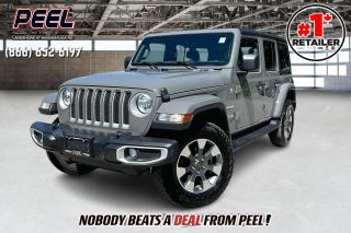 2021 Jeep Wrangler 4-Door Sahara 4X4 | 3.6L V6 | Sting Grey | Heated Seats | Heated Steering Wheel | Remote Start | Uconnect 4C 8.4" Touchscreen w/ Navigation | Alpine Premium Audio System | Apple CarPlay & Android Auto | Black Freedom 3-piece Hard Top

Clean Carfax | HAND SELECTED FORMER DAILY RENTAL

Introducing the 2021 Jeep Wrangler 4-Door Sahara 4X4, a perfect blend of rugged capability and modern comfort. This Sting Grey beauty is powered by a reliable 3.6L V6 engine, ready to tackle any adventure. Stay warm with heated seats and a heated steering wheel, and enjoy the convenience of remote start. The Uconnect 4C system, featuring an 8.4" touchscreen with navigation, Apple CarPlay, and Android Auto, keeps you connected and entertained. The Alpine Premium Audio System ensures superior sound quality. The Black Freedom 3-piece hard top adds versatility and style. With a clean Carfax and hand-selected from a former daily rental fleet, this Wrangler Sahara offers exceptional reliability and value. Dont miss out on this exceptional off-roader thats ready for any journey.
______________________________________________________

Engage & Explore with Peel Chrysler: Whether youre inquiring about our latest offers or seeking guidance, 1-866-652-6197 connects you directly. Dive deeper online or connect with our team to navigate your automotive journey seamlessly.

WE TAKE ALL TRADES & CREDIT. WE SHIP ANYWHERE IN CANADA! OUR TEAM IS READY TO SERVE YOU 7 DAYS! COME SEE WHY NOBODY BEATS A DEAL FROM PEEL! Your Source for ALL make and models used cars and trucks
______________________________________________________

*FREE CarFax (click the link above to check it out at no cost to you!)*

*FULLY CERTIFIED! (Have you seen some of these other dealers stating in their advertisements that certification is an additional fee? NOT HERE! Our certification is already included in our low sale prices to save you more!)

______________________________________________________

Peel Chrysler  A Trusted Destination: Based in Port Credit, Ontario, we proudly serve customers from all corners of Ontario and Canada including Toronto, Oakville, North York, Richmond Hill, Ajax, Hamilton, Niagara Falls, Brampton, Thornhill, Scarborough, Vaughan, London, Windsor, Cambridge, Kitchener, Waterloo, Brantford, Sarnia, Pickering, Huntsville, Milton, Woodbridge, Maple, Aurora, Newmarket, Orangeville, Georgetown, Stouffville, Markham, North Bay, Sudbury, Barrie, Sault Ste. Marie, Parry Sound, Bracebridge, Gravenhurst, Oshawa, Ajax, Kingston, Innisfil and surrounding areas. On our website www.peelchrysler.com, you will find a vast selection of new vehicles including the new and used Ram 1500, 2500 and 3500. Chrysler Grand Caravan, Chrysler Pacifica, Jeep Cherokee, Wrangler and more. All vehicles are priced to sell. We deliver throughout Canada. website or call us 1-866-652-6197. 

Your Journey, Our Commitment: Beyond the transaction, Peel Chrysler prioritizes your satisfaction. While many of our pre-owned vehicles come equipped with two keys, variations might occur based on trade-ins. Regardless, our commitment to quality and service remains steadfast. Experience unmatched convenience with our nationwide delivery options. All advertised prices are for cash sale only. Optional Finance and Lease terms are available. A Loan Processing Fee of $499 may apply to facilitate selected Finance or Lease options. If opting to trade an encumbered vehicle towards a purchase and require Peel Chrysler to facilitate a lien payout on your behalf, a Lien Payout Fee of $299 may apply. Contact us for details. Peel Chrysler Pre-Owned Vehicles come standard with only one key.