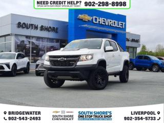 Recent Arrival! Summit White 2019 Chevrolet Colorado ZR2 For Sale, Bridgewater 4WD 8-Speed Automatic V6 Clean Car Fax, 4WD, 4-Way Power Front Passenger Seat Adjuster, 6 Speakers, ABS brakes, Air Conditioning, Alloy wheels, AM/FM radio: SiriusXM, Auto-dimming Rear-View mirror, Automatic temperature control, Black Rear Bumpers, Black Spray-On Bed Liner w/Chevrolet Logo, Compass, Delay-off headlights, Driver 6-Way Power Seat Adjuster, Driver-Selectable Full-Locking Front Differential, Driver-Selectable Full-Locking Rear Differential, Dual front side impact airbags, Electronic Stability Control, Exterior Parking Camera Rear, Front fog lights, Fully automatic headlights, HD Radio, Heated door mirrors, Heated Driver & Front Passenger Seats, Heated front seats, Illuminated entry, Integrated Trailer Brake Controller, Low tire pressure warning, Off-Road Appearance Package, Outside temperature display, Panic alarm, Power door mirrors, Power driver seat, Power Passenger Lumbar Control Seat Adjuster, Power passenger seat, Power steering, Power windows, Radio data system, Rear window defroster, Remote keyless entry, Security system, Speed control, Speed-sensing steering, Telescoping steering wheel, Tilt steering wheel, Traction control, Trip computer, Variably intermittent wipers.