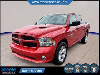 Recent Arrival!Flame Red Clearcoat 2022 Ram 1500 Classic Express | FOR SALE AT STEELE GMC FREDERICTON | 4WD 8-Speed Automatic HEMI 5.7L V8 VVT* Market Value Pricing *, 115-Volt Auxiliary Power Outlet, 17 x 7 Aluminum Wheels, 1-Year SiriusXM Subscription, 20 x 8 Aluminum Wheels, 2nd Row In-Floor Storage Bins, 4-Wheel Disc Brakes, 6 Speakers, ABS brakes, Air Conditioning, AM/FM radio, Audio Input Jack for Mobile Devices, Black Exterior Mirrors, Body-Colour Front Fascia, Body-Colour Grille, Body-Colour Rear Bumper w/Step Pads, Brake assist, Carpet Floor Covering, Cloth Front 40/20/40 Bench Seat, Compass, Delay-off headlights, Driver door bin, Dual front impact airbags, Dual front side impact airbags, Electronic Stability Control, Fog Lamps, Fold-Flat Load Floor, For SiriusXM Info Call 888-539-7474, Front 40/20/40 Split Bench Seat, Front anti-roll bar, Front Armrest w/3 Cup Holders, Front Centre Seat Cushion Storage, Front Floor Mats, Front Heated Seats, Front wheel independent suspension, Fully automatic headlights, GPS Antenna Input, Hands-Free Phone Communication, Heated door mirrors, Heated Exterior Mirrors, Heated Steering Wheel, Heavy Duty Vinyl Front 40/20/40 Bench Seat, Leather-Wrapped Steering Wheel, Low tire pressure warning, Manual Adjust Seats, MOPAR Sport Performance Hood, Occupant sensing airbag, Outside temperature display, Overhead airbag, Overhead console, Park-Sense Rear Park Assist System, Power 10-Way Driver Seat w/Lumbar, Power door mirrors, Power Lumbar Adjust, Power steering, Power windows, Premium Cloth Front 40/20/40 Bench Seat, Quick Order Package 27J Express, Radio data system, Radio: Uconnect 3 w/5 Display, Ram 1500 Express Group, Rear 60/40 Split-Folding Bench Seat, Rear anti-roll bar, Rear Floor Mats, Rear Folding Seat, Rear step bumper, Remote Keyless Entry, Remote USB Charging Port, Remote USB Port, Security Alarm, SiriusXM Satellite Radio, Speed control, Steering Wheel-Mounted Audio Controls, Storage Tray, Sub Zero Package, Tachometer, Tilt steering wheel, Tip Start, Voltmeter, Wheel & Sound Group.Certification Program Details: 80 Point Inspection Fresh Oil Change Full Vehicle Detail Full tank of Gas 2 Years Fresh MVI Brake through InspectionSteele GMC Buick Fredericton offers the full selection of GMC Trucks including the Canyon, Sierra 1500, Sierra 2500HD & Sierra 3500HD in addition to our other new GMC and new Buick sedans and SUVs. Our Finance Department at Steele GMC Buick are well-versed in dealing with every type of credit situation, including past bankruptcy, so all customers can have confidence when shopping with us!Steele Auto Group is the most diversified group of automobile dealerships in Atlantic Canada, with 47 dealerships selling 27 brands and an employee base of well over 2300.