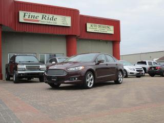 <p>2013 Ford Fusion SE FWD</p><p>1.6LTR turbo<br>A/C<br>Telescopic tilt steering<br>Cruise<br>Power windows<br>Power locks<br>Power mirrors<br>Power heated seats<br>5 passengers<br>208,000kms<br>AM/FM radio<br>SYNC by Microsoft / Bluetooth<br>Back up camera<br>Brand new tires<br>Alloy wheels<br>Fog lights<br>Sunroof<br>Economical transportation<br>Original Manitoba car!</p><p>$10,975 Safetied<br>Financing and Warranty Available at Fine Ride Auto Sales Ltd<br>www.FineRideAutoSales.ca</p><p>Call: 204-415-3300 or 1-855-854-3300<br>Text: 204-226-1790<br>View in person at: Unit 3-3000 Main Street</p><p>DLR# 4614<br>**Plus applicable taxes**</p><p></p><p style=text-align:center;><span style=color:#000000;><i><span style=font-family:book antiqua, palatino, serif;font-size:14pt;><strong><u>***NEW HOURS EFFECTIVE MAY 15, 2024***</u></strong></span></i></span></p><p style=text-align:center;><span style=color:#000000;><span style=font-family:book antiqua, palatino, serif;font-size:14pt;>Monday                9am to 6pm</span></span><br><span style=color:#000000;><span style=font-family:book antiqua, palatino, serif;font-size:14pt;>Tuesday               9am to 6pm</span></span><br><span style=color:#000000;><span style=font-family:book antiqua, palatino, serif;font-size:14pt;>Wednesday               9am to 6pm</span></span><br><span style=color:#000000;><span style=font-family:book antiqua, palatino, serif;font-size:14pt;>Thursday                9am to 6pm</span></span><br><span style=color:#000000;><span style=font-family:book antiqua, palatino, serif;font-size:14pt;>Friday                9am to 5pm</span></span><br><span style=color:#000000;><span style=font-family:book antiqua, palatino, serif;font-size:14pt;>Saturday                   10am to 2pm</span></span><br><span style=color:#000000;><span style=font-family:book antiqua, palatino, serif;font-size:14pt;>Sunday                    CLOSED</span></span></p><p style=text-align:center;><span style=color:#000000;><i><span style=font-family:book antiqua, palatino, serif;font-size:14pt;><strong>***CLOSED SATURDAY, SUNDAY & MONDAYS FOR LONG WEEKENDS***</strong></span></i></span></p>
