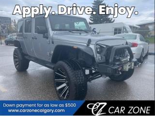 <p>Carzone is pleased to offer this 2015 Jeep Unlimited Sahara. Has Rough Country heavy duty suspension lift, Rough Country front bumper and winch, 22 inch Fuel Contra wheels with full sized spare, brand new all weather tires, side steps, Bush Wacker fender flares, upgraded touch screen with Apple car play, LED headlights, remote starter and more. </p><p>CARFAX LINK: https://vhr.carfax.ca/?id=v6kBezugJFydIyvuG%2FH1keaCufBhMb4b</p><p>Looking for Your Dream Car? Call Carzone Today!</p><p>Explore our impressive selection of vehicles at Carzone. Were open 6 days a week, and Sundays are available by appointment. With EASY FINANCING and ZERO DOWN payment options, owning your dream car has never been easier. Enjoy the peace of mind of a NORTH AMERICAN WIDE WARRANTY and CARFAX report. Trade-ins are always welcome, making your upgrade seamless. Visit us online at carzonecalgary.ca and experience the difference. As an AMVIC licensed dealer, Carzone specializes in turning your vehicle dreams into reality. No matter your credit history – bankruptcy, self-employed, bank repo, new to Canada – ALL CREDIT TYPES ARE WELCOME. Multiple banks are ready to work with you. Apply online at CARZONECALGARY and let us guide you toward your dream car. Were here to assist you every step of the way. Your credit acceptance is our priority. Contact Carzone now to discover how we can earn your business today.</p>