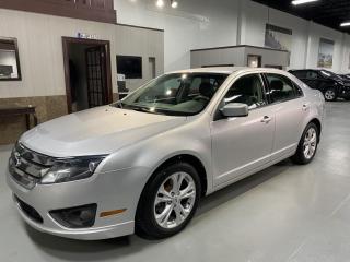 LOW KMS<br>NO ACCIDENTS<br>This Ford Fusion 3.0L 6CYL is in absolute perfect condition inside and out. <br>POWER SEAT, XENON LIGHTS, ELECTRIC MIRRORS,  POWER MIRRORS, AIR CONDITIONING, TRACTION CONTROL, 3.0L FLEX FUEL V6 240HP.<br><br>No Accidents as per Carfax.<br>Extended Warranty available<br>Accessories available at request. H.S.T. & licensing extra.<br>As per omvic regulations this vehicle is not certified and e-tested. Certification and 90 day powertrain warranty is available for $899.<br>FINANCING and LEASING options at preferred rates on O.A.C. on all vehicles.<br>Call us 905-760-1909<br>         <br>Please visit our new 20,000 sqft showroom, No haggle, No hassle in a care free environment with Espresso or Cappuccino by Lavazza on us!<br>
