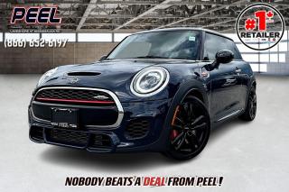 2019 Mini John Cooper Works | Heated Leather Seats | Dual-pane Panoramic Sunroof | Harman/Kardon Premium Audio System | Apple CarPlay & Android Auto | Navigation | Heads Up Display

Introducing the 2019 Mini John Cooper Works, a high-performance compact car that combines style, agility, and luxury. Finished in an eye-catching color, this car is equipped with the Premium Package and offers an exhilarating driving experience. Enjoy the comfort of heated leather seats and the expansive view through the dual-pane panoramic sunroof. The Harman/Kardon premium sound system delivers exceptional audio quality, perfect for any journey. The Uconnect 8.4" touchscreen with navigation, Apple CarPlay, and Android Auto ensures you stay connected, while the safety features like blind spot monitoring and parking sensors provide peace of mind. Elevate your drive with the 2019 Mini John Cooper Works, where performance meets sophistication.
______________________________________________________

Engage & Explore with Peel Chrysler: Whether youre inquiring about our latest offers or seeking guidance, 1-866-652-6197 connects you directly. Dive deeper online or connect with our team to navigate your automotive journey seamlessly.

WE TAKE ALL TRADES & CREDIT. WE SHIP ANYWHERE IN CANADA! OUR TEAM IS READY TO SERVE YOU 7 DAYS! COME SEE WHY NOBODY BEATS A DEAL FROM PEEL! Your Source for ALL make and models used cars and trucks
______________________________________________________

*FREE CarFax (click the link above to check it out at no cost to you!)*

*FULLY CERTIFIED! (Have you seen some of these other dealers stating in their advertisements that certification is an additional fee? NOT HERE! Our certification is already included in our low sale prices to save you more!)

______________________________________________________

Peel Chrysler  A Trusted Destination: Based in Port Credit, Ontario, we proudly serve customers from all corners of Ontario and Canada including Toronto, Oakville, North York, Richmond Hill, Ajax, Hamilton, Niagara Falls, Brampton, Thornhill, Scarborough, Vaughan, London, Windsor, Cambridge, Kitchener, Waterloo, Brantford, Sarnia, Pickering, Huntsville, Milton, Woodbridge, Maple, Aurora, Newmarket, Orangeville, Georgetown, Stouffville, Markham, North Bay, Sudbury, Barrie, Sault Ste. Marie, Parry Sound, Bracebridge, Gravenhurst, Oshawa, Ajax, Kingston, Innisfil and surrounding areas. On our website www.peelchrysler.com, you will find a vast selection of new vehicles including the new and used Ram 1500, 2500 and 3500. Chrysler Grand Caravan, Chrysler Pacifica, Jeep Cherokee, Wrangler and more. All vehicles are priced to sell. We deliver throughout Canada. website or call us 1-866-652-6197. 

Your Journey, Our Commitment: Beyond the transaction, Peel Chrysler prioritizes your satisfaction. While many of our pre-owned vehicles come equipped with two keys, variations might occur based on trade-ins. Regardless, our commitment to quality and service remains steadfast. Experience unmatched convenience with our nationwide delivery options. All advertised prices are for cash sale only. Optional Finance and Lease terms are available. A Loan Processing Fee of $499 may apply to facilitate selected Finance or Lease options. If opting to trade an encumbered vehicle towards a purchase and require Peel Chrysler to facilitate a lien payout on your behalf, a Lien Payout Fee of $299 may apply. Contact us for details. Peel Chrysler Pre-Owned Vehicles come standard with only one key.