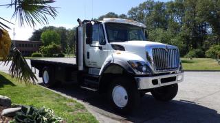 2015 International 7400 16 Foot Flat Deck Diesel 4X4, 7.6L L6 DIESEL engine, Automatic, 4X4, Cruise Control, Work Light, Regen, Roda Deaco Van, Allison Automatic, Air Conditioning, AM/FM radio, CD player, Differential Lock, 4WD High & Low, Eberspacher Heater, White Exterior. Deck Dimensions: Length 16 Feet Width 8 Feet 5 Inches. Engine Hours: 6395 Certificate and Decal Valid to May 2025 $58,750.00 plus $375 processing fee, $59,125.00 total payment obligation before taxes.  Listing report, warranty, contract commitment cancellation fee, financing available on approved credit (some limitations and exceptions may apply). All above specifications and information is considered to be accurate but is not guaranteed and no opinion or advice is given as to whether this item should be purchased. We do not allow test drives due to theft, fraud and acts of vandalism. Instead we provide the following benefits: Complimentary Warranty (with options to extend), Limited Money Back Satisfaction Guarantee on Fully Completed Contracts, Contract Commitment Cancellation, and an Open-Ended Sell-Back Option. Ask seller for details or call 604-522-REPO(7376) to confirm listing availability.