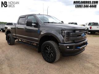 <b>Power Stroke, Heated Seats, Sunroof, Navigation, Leather Interior!</b><br> <br> Check out our great inventory of pre-owned vehicles at Novlan Brothers!<br> <br>   This Ford F-350 boasts a quiet cabin, a compliant ride, and incredible capability. This  2018 Ford F-350 Super Duty is fresh on our lot in Paradise Hill. <br> <br>High-strength, military grade aluminum construction in the body of this F-350 cuts out weight without sacrificing toughness. That weight reduction was reinvested in a fully boxed frame and stronger axles and chassis components. That brilliant engineering doesnt stop in the frame and body - the drivetrain at the heart of this Super Duty delivers the power and torque you need to get the job done. This truck is strong, comfortable, and ready for anything. This  sought after diesel Crew Cab 4X4 pickup  has 325,929 kms. Its  grey in colour  . It has a 6 speed automatic transmission and is powered by a  450HP 6.7L 8 Cylinder Engine.  <br> <br> Our F-350 Super Dutys trim level is Lariat. This Super Duty Lariat offers a great blend of features and value. This truck comes with leather seats which are heated and cooled in front, SYNC 3 infotainment system with Bluetooth and SiriusXM, Sony premium audio, 2 smart charging USB ports, a rearview camera with reverse sensing system, aluminum wheels, dual-zone automatic climate control, running boards, power folding and telescoping trailer tow mirrors, a trailer hitch, and more. This vehicle has been upgraded with the following features: Power Stroke, Heated Seats, Sunroof, Navigation, Leather Interior, Alloy Wheels, Remote Engine Start. <br> To view the original window sticker for this vehicle view this <a href=http://www.windowsticker.forddirect.com/windowsticker.pdf?vin=1FT8W3BT4JEC32499 target=_blank>http://www.windowsticker.forddirect.com/windowsticker.pdf?vin=1FT8W3BT4JEC32499</a>. <br/><br> <br>To apply right now for financing use this link : <a href=http://novlanbros.com/credit/ target=_blank>http://novlanbros.com/credit/</a><br><br> <br/><br>The Novlan family is owned and operated by a third generation and committed to the values inherent from our humble beginnings.<br> Come by and check out our fleet of 30+ used cars and trucks and 60+ new cars and trucks for sale in Paradise Hill.  o~o
