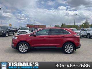 <b>Low Mileage, Leather Seats,  Premium Audio,  Heated Seats,  Power Liftgate,  Apple CarPlay!</b><br> <br> Check out the large selection of pre-owned vehicles at Tisdales today!<br> <br>   Change the game with the unique styling of the aggressive Ford Edge. This  2022 Ford Edge is fresh on our lot in Kindersley. <br> <br>With meticulous attention to detail and amazing style, the Ford Edge seamlessly integrates power, performance and handling with awesome technology to help you multitask your way through the challenges that life throws your way. Made for an active lifestyle and spontaneous getaways, the Ford Edge is as rough and tumble as you are. Push the boundaries and stay connected to the road with this sweet ride!This low mileage  SUV has just 12,890 kms. Its  rapid red metallic tinted clearcoat in colour  . It has an automatic transmission and is powered by a  250HP 2.0L 4 Cylinder Engine.  This unit has some remaining factory warranty for added peace of mind. <br> <br> Our Edges trim level is Titanium. Upgrading to this Edge Titanium is a great choice as it comes loaded with an impressive list of features including unique aluminum wheels and exterior chrome trim, a premium 12 speaker Bang & Olufsen sound system, a power rear liftgate, power and heated leather seats, FordPass Connect with a 4G LTE hotspot, a 12 inch touchscreen featuring SYNC 4, wireless Apple CarPlay and Android Auto, a leather wrapped steering wheel and dual zone automatic climate control. For added safety and convenience, you will also get Ford Co-Pilot360 with blind spot assist, lane keep assist, automatic emergency braking, lane departure warning, a proximity key for push button start, rear parking sensors, front fog lights, a remote engine start plus so much more. This vehicle has been upgraded with the following features: Leather Seats,  Premium Audio,  Heated Seats,  Power Liftgate,  Apple Carplay,  Android Auto,  Remote Start. <br> To view the original window sticker for this vehicle view this <a href=http://www.windowsticker.forddirect.com/windowsticker.pdf?vin=2FMPK4K98NBA84744 target=_blank>http://www.windowsticker.forddirect.com/windowsticker.pdf?vin=2FMPK4K98NBA84744</a>. <br/><br> <br>To apply right now for financing use this link : <a href=http://www.tisdales.com/shopping-tools/apply-for-credit.html target=_blank>http://www.tisdales.com/shopping-tools/apply-for-credit.html</a><br><br> <br/><br>Tisdales is not your standard dealership. Sales consultants are available to discuss what vehicle would best suit the customer and their lifestyle, and if a certain vehicle isnt readily available on the lot, one will be brought in.<br> Come by and check out our fleet of 20+ used cars and trucks and 90+ new cars and trucks for sale in Kindersley.  o~o