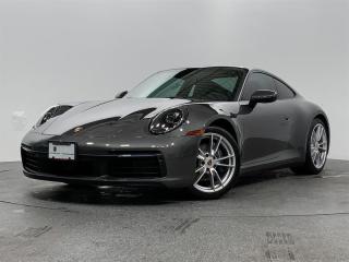 This 2022 Porsche 911 Carrera Coupe comes in stunning Agate Grey Metallic Paint. The interior is Black & Mojave Beige Leather Interior. Highly optioned with Premium Plus Package,  Adaptive Sport Seats (18 Way) with Memory Package, Adaptive Cruise Control, Bose Surround Sound System, Ambient Lighting,  and numerous other premium features! Features Adaptive Air Suspension including Porsche Active Suspension Management. It boasts a clean history with no reported accidents or claims, having been meticulously maintained by its dedicated owner.Porsche Center Langley has won the prestigious Porsche Premier Dealer Award for 7 years in a row. We are centrally located just a short distance from Highway 1 in beautiful Langley, British Columbia Canada.  We have many attractive Finance/Lease options available and can tailor a plan that suits your needs. Please contact us now to speak with one of our highly trained Sales Executives before it is gone.