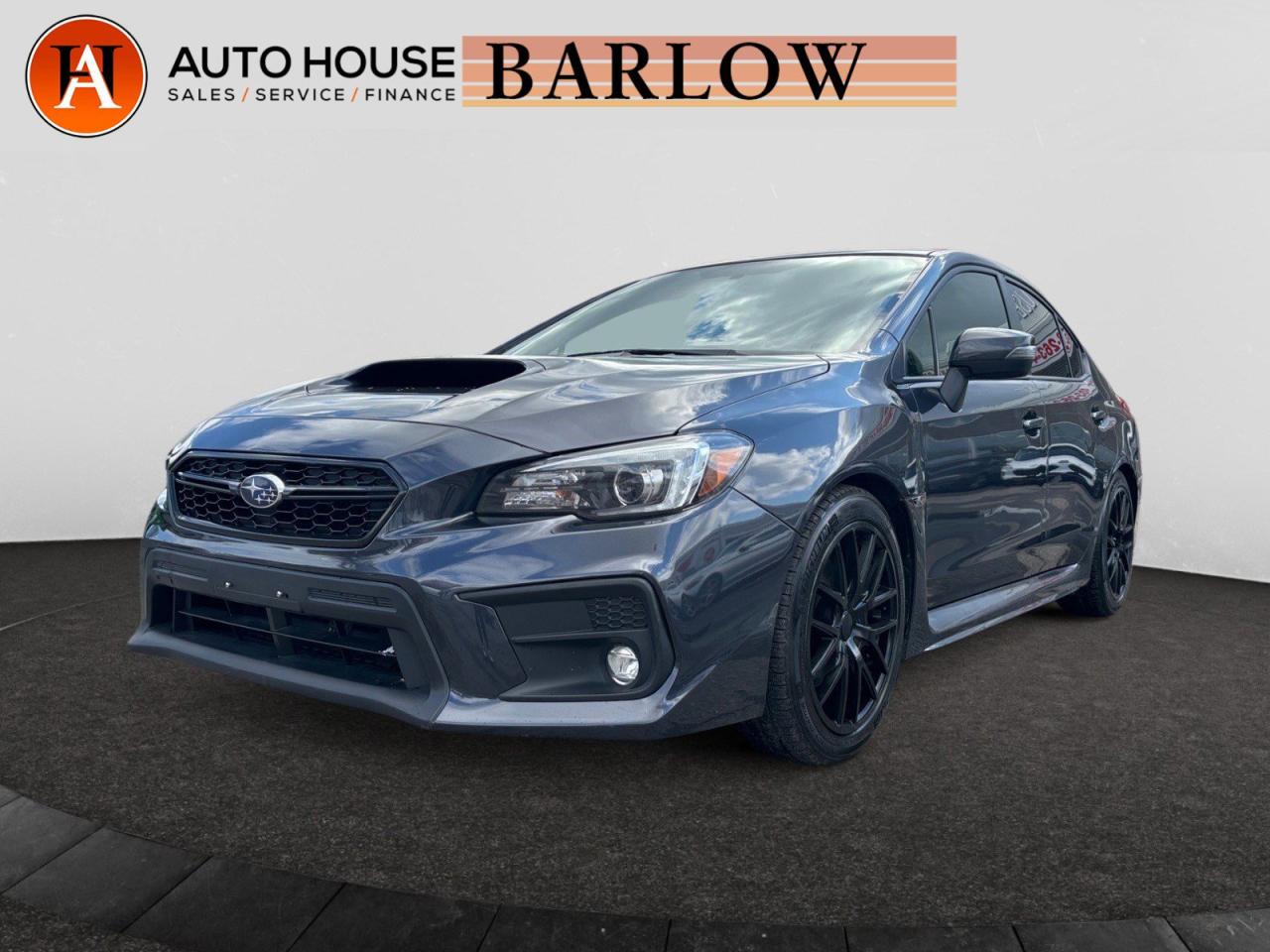 <div>Used | Sedan | Black | 2018 | Subaru | WRX | Sport Tech | AWD | Sunroof | Heated Seats</div><div> </div><div>2018 SUBARU WRX SPORT TECH WITH 79283 KMS, MANUAL, NAVIGATION, BACKUP CAMERA, SUNROOF, BLIND SPOT DETECTION, LEATHER SEATS, HEATED SEATS, PUSH-BUTTON START, BLUETOOTH, HARMAN/KARDON SOUND SYSTEM, HEATED MIRRORS AND MORE!</div><div>.<br />ALL CREDIT ACCEPTED!<br />One month at a job? Bankruptcy? New to Canada? Collections? Student or work visas? Previous repossessions? Good or bad credit? Weve got you covered! Get pre-approved today at www.autoshouse.com!<br /><br />What We Offer:<br /><br />*Low Bi-Weekly Payments<br />*Instant Approvals<br />*Credit Consolidation<br />*Employment Insurance<br />*Negative Equity Coverage<br /><br />Operating Hours:<br />Mon-Thurs: 10 am -- 8 pm<br />Fri-Sat: 10 am -- 6 pm<br /><br />Call 403-263-4446! All vehicles come with a full mechanical fitness assessment and CARFAX report.<br /><br />Referral Program:<br />Refer friends and family and earn $500 for each referral!<br />(Subject to Terms and Conditions)<br />AMVIC Licensed Dealer<br /><br />After a credit check, we can determine payments, APR, terms, and interest rates based on your credit (O.A.C). Prices are based on the vehicle only. Fees, aftermarket products, and GST are extra (O.A.C). Individual credit will affect bi-weekly payments and the total cost of credit. Similar to Chevrolet, GMC, Honda, Toyota, Cadillac, Nissan, Ford, Volvo 2007, 2008, 2009, 2010, 2011, 2012, 2013, 2014, 2015, 2016, 2017, 2018<br /><br />Location: 2404 23rd Ave. N.E. Calgary AB, T2E 8J4</div>