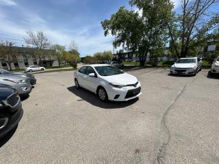 Used 2014 Toyota Corolla 4dr Sdn CVT LE for sale in Calgary, AB