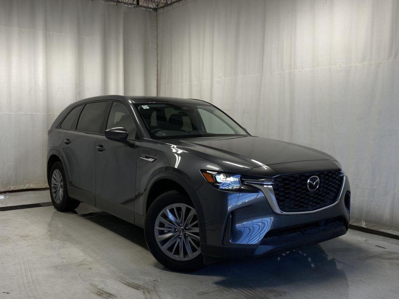 <p>NEW 2024 Mazda CX-90 PHEV GS AWD. Bluetooth, Mi-Drive, Cloth Upholstery, Rear Parking Sensor, Panoramic Moonroof, Wiper De-Icer, Roof Rails, Third Row Seating, Heated Front Seats, Heated Steering Wheel, Electronic Parking Brake, Auto Hold, Rear Climate Control, Tri-Zone Climate Control, 19 Silver Metallic Alloy Wheels</p>  <p>Includes:</p>   <p>Standard on 2024 Mazda CX-90 i-ACTIVSENSE + Safety Features (Smart Brake Support-Front, Driver Attention Alert, Rear Cross Traffic Alert, Mazda Radar Cruise Control With Stop & Go, Emergency Lane Keeping with Road Keep Assist, Lane-Keep Assist System, Lane Departure Warning System, Blind Spot Monitoring, Distance & Speed Alert)</p>    <p>Enjoy the journey in our 2024 Mazda CX-90 PHEV GS AWD, which is comfortably capable in Platinum Quartz Metallic! Motivated by a Hybrid 2.5 Liter Inline 4 and an Electric Motor delivering 42 KM of range, totaling a combined 340hp to an 8 Speed Automatic transmission. This All Wheel Drive SUV also rides with Off-Road, Sport, and Towing Modes, and it sees nearly approximately 9.4L/100km on the highway. A refined design is another benefit of our CX-90. Check out its LED lighting, and 19-inch alloy wheels.</p>  <p>Our CX-90 cabin treats your family to better travel with heated leatherette power front seats, a folding third row, a leather-wrapped steering wheel, tri-zone automatic climate control, and keyless access/ignition. Digitally dominate daily errands and extraordinary adventures with a 10.25-inch color display, Android Auto/Apple CarPlay, a Commander controller, available NAV, and voice control.</p>  <p>Safety is paramount for Mazda, so youre protected by automatic braking, a rearview camera, adaptive cruise control, blind-spot monitoring, rear cross-traffic alert, lane-keeping assistance, and other smart technologies. Carefully crafted, our CX-90 PHEV GS AWD can be yours today! Save this Page and Call for Availability. We Know You Will Enjoy Your Test Drive Towards Ownership!</p>  <p>This vehicle is being sold as is. This refers to the stipulation where the buyer agrees to purchase the vehicle in its current condition, without legal recourse should the buyer discover a defect in the vehicle after purchase. Pricing can vary depending on having repairs completed. Please contact dealer for details.</p>