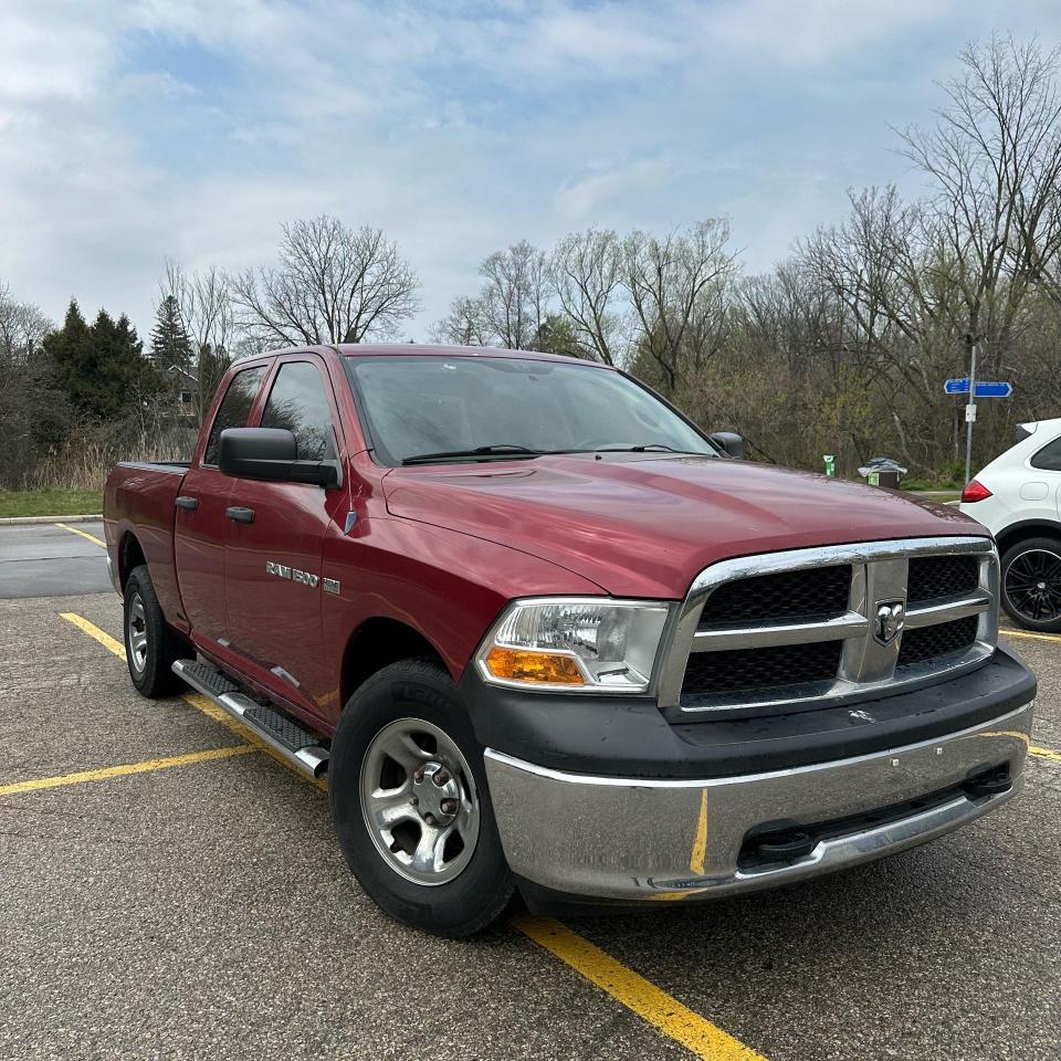 Used 2011 RAM 1500 4WD QUAD CAB 140.5