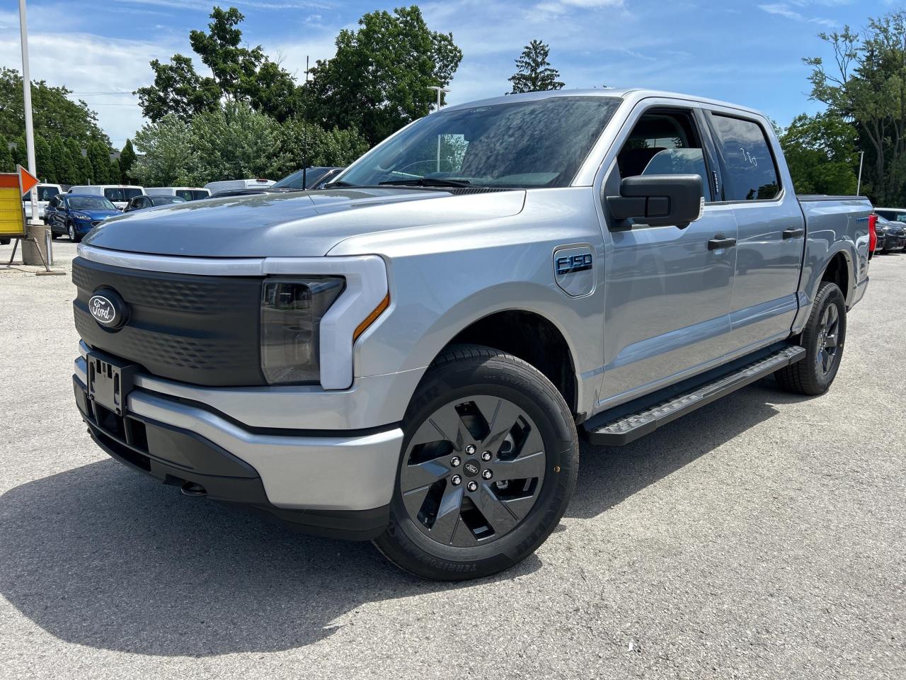 Electric Vehicle, Heated Seats, Apple CarPlay, Android Auto, Navigation, 360 Camera, Power Tailgate, Adaptive Cruise Control, Blind Spot Detection, Lane Keep Assist, Forward Collision Alert, Ford Co-Pilot360, 4G WiFi, Tow Package, SiriusXM           Many of our Demonstrators and Loaners are currently available for sale now that 2024 replacement vehicles have arrived. Ask for more details!    Why Buy From Winegard Ford?   * No Administration fees  * No Additional Charges for Factory Orders  * 100 Point Inspection on All Used Vehicles  * Full Tank of Fuel with Every New or Used Vehicle Purchase  * Licensed Ford Accessories Available  *  Window Tinting Available  * Custom Truck Lift and Leveling Packages Available         Hello.             This iconic silver metallic Super Crew 4X4 pickup   has a manual transmission and is powered by a  Electric engine.      Our F-150 Lightnings trim level is XLT. Engineered to be a do-it-all EV, this F-150 Lightning XLT comes very well equipped with a luxurious interior that includes heated front seats and a heated steering wheel, power adjustable pedals, Fords SYNC 4 infotainment system complete with voice recognition, built-in navigation, Apple CarPlay, Android Auto, and SiriusXM radio. It also comes with extended running boards and enhanced lighting, Ford Co-Pilot360 2.0, a super useful interior work surface, a class IV towing package, power locking tailgate, a large front trunk for extra storage, a proximity key, blind spot detection, lane keep assist, automatic emergency braking with pedestrian detection, accident evasion assist, and a 360 degree camera to help keep you safely on the road and so much more!      View the original window sticker for this vehicle with this url http://www.windowsticker.forddirect.com/windowsticker.pdf?vin=1FTVW3LKXRWG17810.     To apply right now for financing use this link : http://www.winegardford.com/financing/application.htm         Total  cash rebate of $6500 is reflected in the price. Credit includes $6,500 Delivery Allowance.  5.99% financing for 84 months.    Buy this vehicle now for the lowest bi-weekly payment of $515.25 with $0 down for 84 months @ 5.99% APR O.A.C. ( taxes included, $13 documentation fee   / Total cost of borrowing $17249   ).  Incentives expire 2024-12-02.  See dealer for details.       o~o