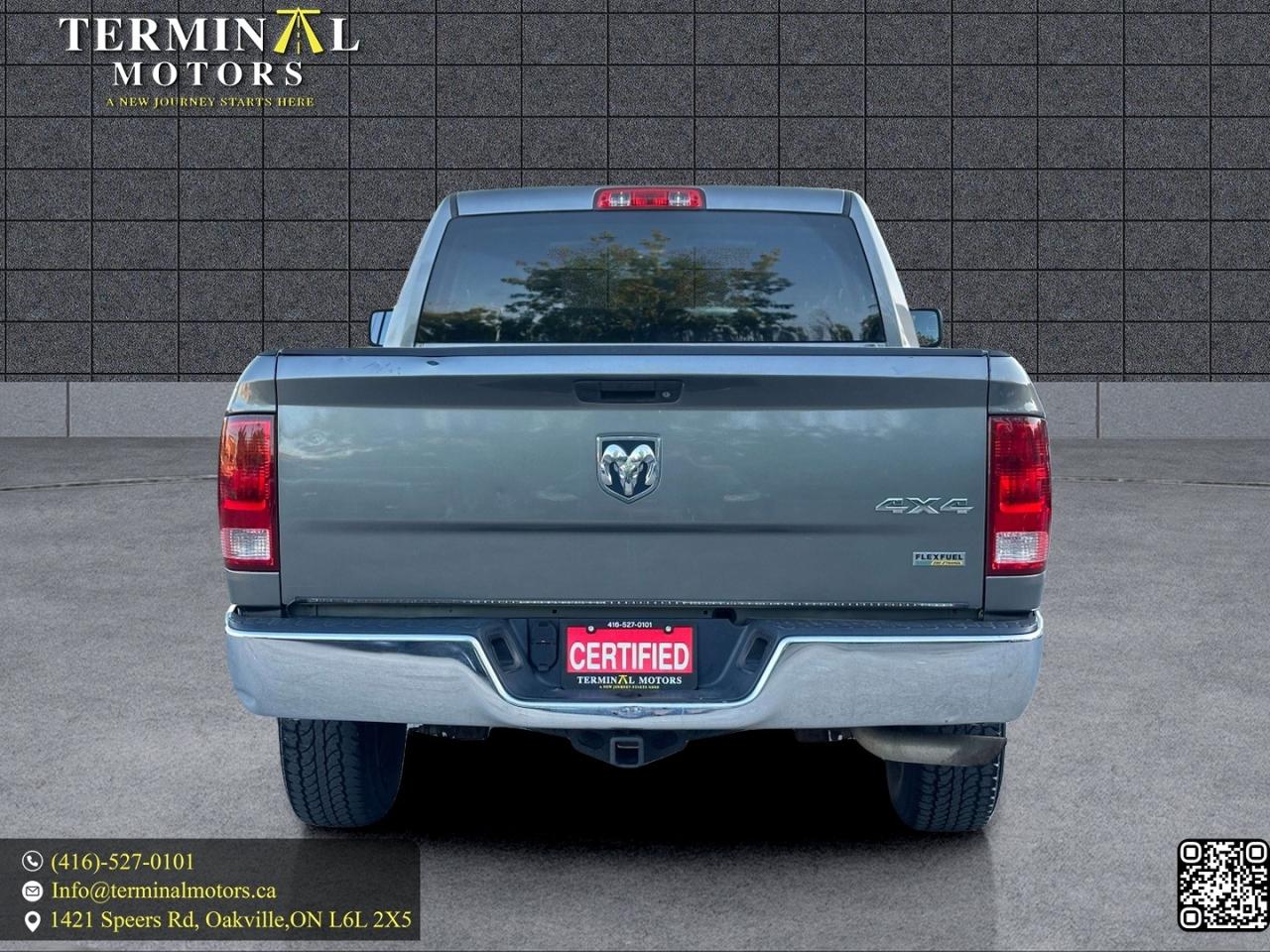 2012 RAM 1500 4WD Quad Cab 140.5" Photo3