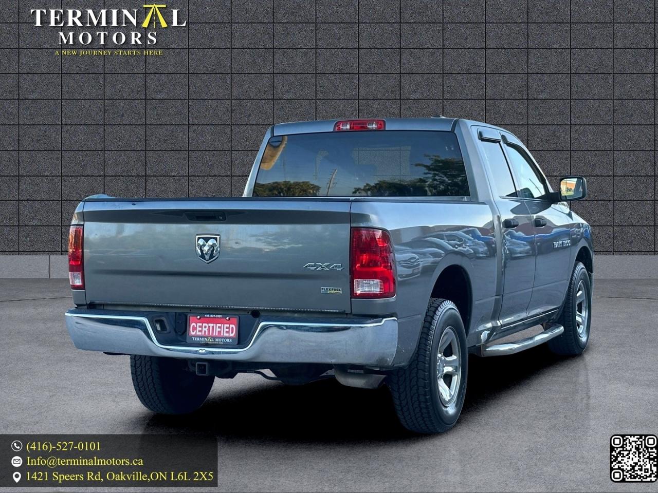 2012 RAM 1500 4WD Quad Cab 140.5" Photo4