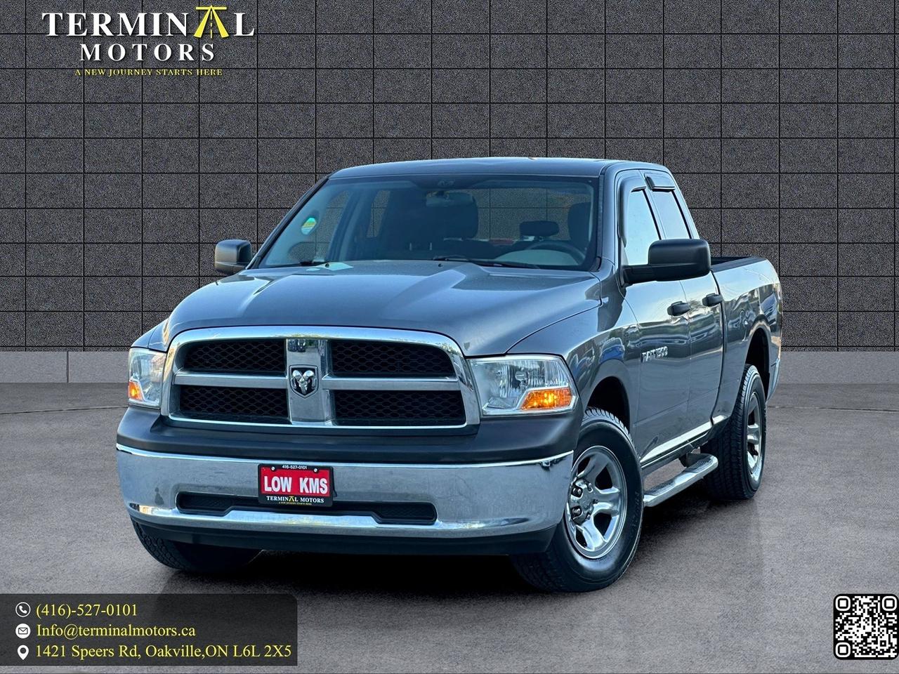 2012 RAM 1500 4WD Quad Cab 140.5" - Photo #1