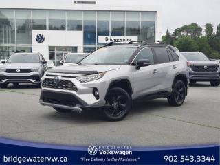 New Price! Silver Sky Metallic 2021 Toyota RAV4 Hybrid XLE AWD | Apple Carplay | Android Auto | Sirus XM AWD CVT 2.5L 4-Cylinder DOHC Bridgewater Volkswagen, Located in Bridgewater Nova Scotia.2.5L 4-Cylinder DOHC, 4-Wheel Disc Brakes, 6 Speakers, ABS brakes, Air Conditioning, Alloy wheels, AM/FM radio, Apple CarPlay/Android Auto, Auto High-beam Headlights, Automatic temperature control, Brake assist, Bumpers: body-colour, Delay-off headlights, Driver door bin, Driver vanity mirror, Dual front impact airbags, Dual front side impact airbags, Electronic Stability Control, Emergency communication system: Safety Connect (Connected Services by Toyota), Exterior Parking Camera Rear, Four wheel independent suspension, Front anti-roll bar, Front Bucket Seats, Front dual zone A/C, Front fog lights, Front reading lights, Fully automatic headlights, Heated door mirrors, Heated Front Bucket Seats, Heated front seats, Heated steering wheel, Illuminated entry, Knee airbag, Leather Shift Knob, Occupant sensing airbag, Outside temperature display, Overhead airbag, Overhead console, Panic alarm, Passenger door bin, Passenger vanity mirror, Power door mirrors, Power driver seat, Power Liftgate, Power moonroof, Power steering, Power windows, Premium Cloth Fabric Seat Trim, Radio: Audio, Rain sensing wipers, Rear anti-roll bar, Rear window defroster, Rear window wiper, Remote keyless entry, Roof rack: rails only, Speed control, Speed-sensing steering, Split folding rear seat, Spoiler, Steering wheel mounted audio controls, TBD Axle Ratio, Telescoping steering wheel, Tilt steering wheel, Traction control, Trip computer, Turn signal indicator mirrors, Variably intermittent wipers.Certification Program Details: 150 Points Inspection Fresh Oil Change Free Carfax Full Detail 2 years MVI Full Tank of Gas The 150+ point inspection includes: Engine Instrumentation Interior components Pre-test drive inspections The test drive Service bay inspection Appearance Final inspection