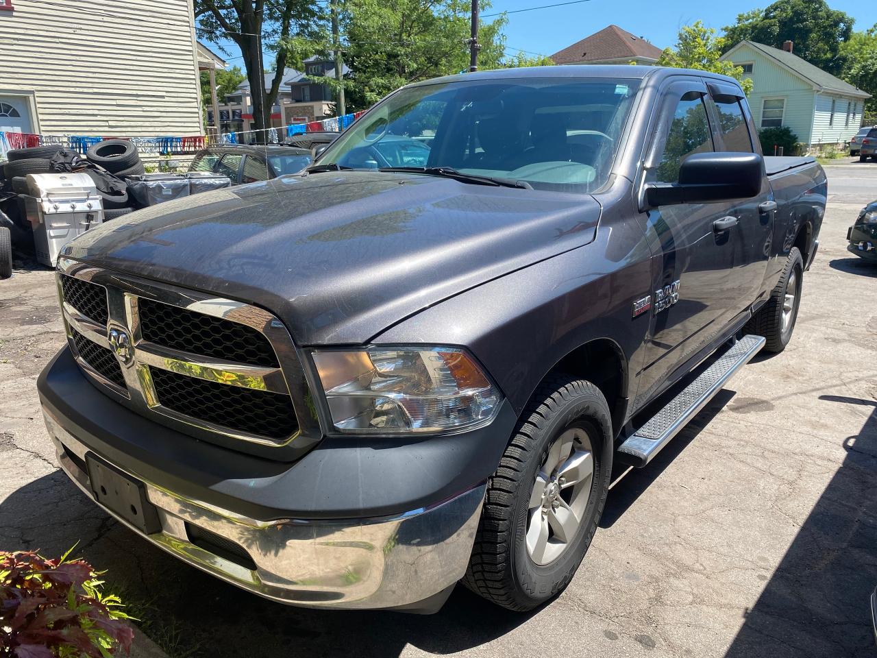 Used 2014 RAM 1500 4WD QUAD CAB 140.5