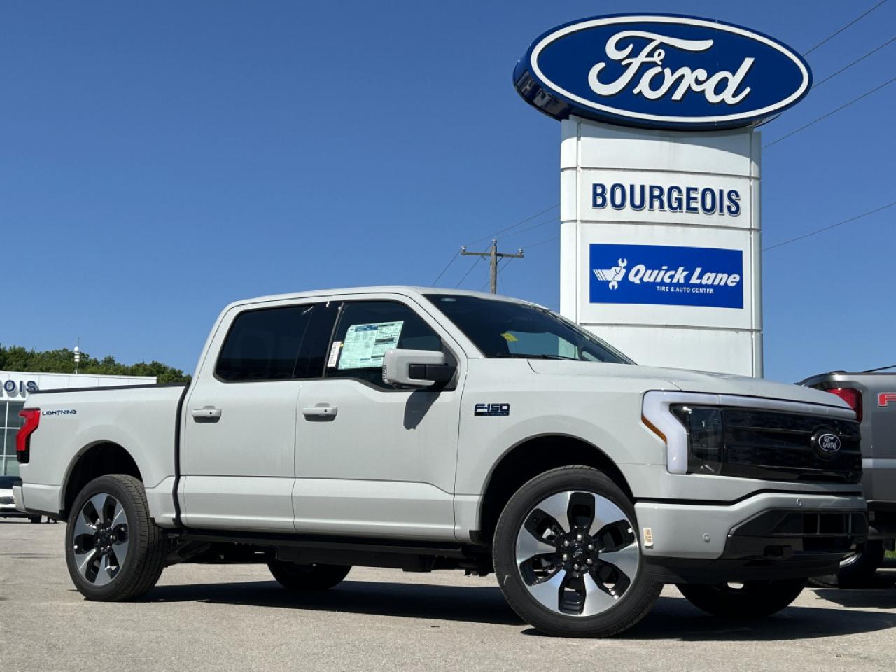 <b>Spray-In Bed Liner, 22 Aluminum Wheels, Leather Bucket Seats!</b><br> <br> <br> <br>Please note that on 2024 Standard Range F-150 Lightning Models, the discounted price includes the $5000 Federal Government iZEV rebates for customers that choose to purchase or lease their new Ford Lightning PHEV over 48 months. Federal incentive may vary  Welcome. <br> <br><br> <br> This avalanche grey Crew Cab 4X4 pickup   has a cvt transmission and is powered by a  DUAL EMOTOR - EXTENDED RANGE BATTERY engine.<br> <br> Our F-150 Lightnings trim level is Platinum. This F-150 Lightning Platinum is the ultimate in luxury electric trucks with an extra luxurious Nirvana leather interior that features a massive twin panel sunroof, Fords impressive SYNC 4A infotainment system complete with a larger 15 inch touchscreen, built-in navigation, wireless Apple CarPlay, Android Auto, and a premium Bang and Olufsen audio system. It also comes with exclusive aluminum wheels, heated and cooled front seats, a heated steering wheel and heated second row seats, an extended battery range, Ford Co-Pilot360 Active 2.0, and a super useful interior work surface. Additional features include a large front trunk for extra storage, pro trailer backup assist, blind spot detection, lane keep assist, a power locking tailgate, automatic emergency braking with pedestrian detection, accident evasion assist, and a 360 degree camera to help keep you safely on the road plus so much more! This vehicle has been upgraded with the following features: Spray-in Bed Liner, 22 Aluminum Wheels, Leather Bucket Seats. <br><br> View the original window sticker for this vehicle with this url <b><a href=http://www.windowsticker.forddirect.com/windowsticker.pdf?vin=1FT6W7L73RWG03187 target=_blank>http://www.windowsticker.forddirect.com/windowsticker.pdf?vin=1FT6W7L73RWG03187</a></b>.<br> <br>To apply right now for financing use this link : <a href=https://www.bourgeoismotors.com/credit-application/ target=_blank>https://www.bourgeoismotors.com/credit-application/</a><br><br> <br/> 5.99% financing for 84 months.  Incentives expire 2024-12-02.  See dealer for details. <br> <br>Discount on vehicle represents the Cash Purchase discount applicable and is inclusive of all non-stackable and stackable cash purchase discounts from Ford of Canada and Bourgeois Motors Ford and is offered in lieu of sub-vented lease or finance rates. To get details on current discounts applicable to this and other vehicles in our inventory for Lease and Finance customer, see a member of our team. </br></br>Discover a pressure-free buying experience at Bourgeois Motors Ford in Midland, Ontario, where integrity and family values drive our 78-year legacy. As a trusted, family-owned and operated dealership, we prioritize your comfort and satisfaction above all else. Our no pressure showroom is lead by a team who is passionate about understanding your needs and preferences. Located on the shores of Georgian Bay, our dealership offers more than just vehiclesits an experience rooted in community, trust and transparency. Trust us to provide personalized service, a diverse range of quality new Ford vehicles, and a seamless journey to finding your perfect car. Join our family at Bourgeois Motors Ford and let us redefine the way you shop for your next vehicle.<br> Come by and check out our fleet of 70+ used cars and trucks and 170+ new cars and trucks for sale in Midland.  o~o