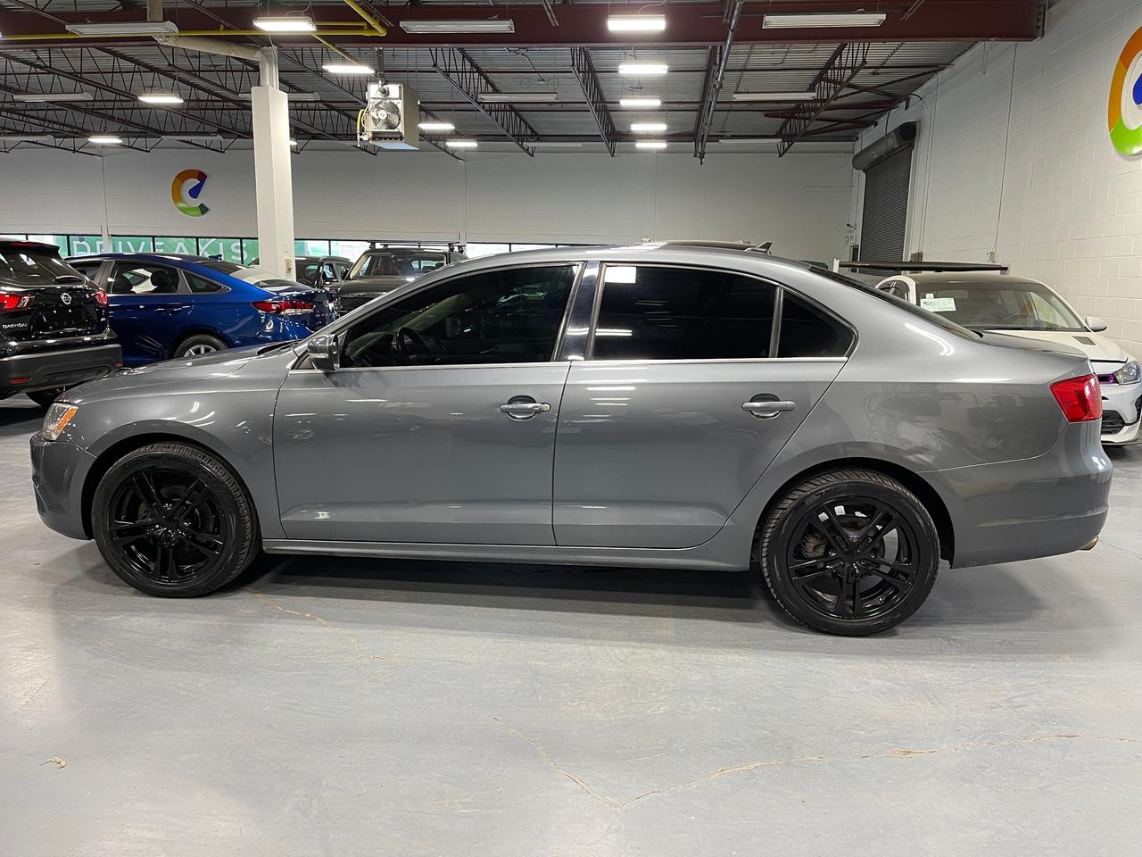 2013 Volkswagen Jetta 4dr 2.0T TDI DSG Highline Photo1