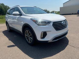 <span>The 2017 Hyundai Santa Fe XL means business. Theres a 290-horsepower V6, ample space for across three rows, towing capacity of up to 5,000 pounds, and all-wheel drive. At a high-value price point, this Santa Fe XL Premium also includes a wide variety of high-end features: heated front and second row seats plus a heated steering wheel, power liftgate, blind spot monitoring with lane change assist, proximity access/pushbutton start, and a 12-way power drivers seat. Theres also dual-zone automatic climate control, second-row sunshades, rear parking sensors, and a leather-wrapped steering wheel and shifter.</span>




<span>Those are just some of the extras in the all-wheel-drive Santa Fe XL. Theres a rearview camera, 18-inch alloys, sliding second-row seats, LED headlights, and rear cross-traffic alert. Plus the Santa Fe XL is simply huge inside, with 1,158 litres of cargo space behind the second row and 2,265 litres behind the front seats.</span>




<span style=font-weight: 400;>Thank you for your interest in this vehicle. Its located at Centennial Honda, 610 South Drive, Summerside, PEI. We look forward to hearing from you; call us toll-free at 1-902-436-9158.</span>