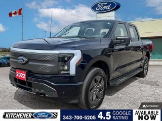 Antimatter Blue Metallic 2022 Ford F-150 Lightning XLT 4D Crew Cab Electric Motor Single-Speed Automatic AWD | Bought here, serviced here, 4-Wheel Disc Brakes, 6 Speakers, ABS brakes, Adjustable pedals, Air Conditioning, Alloy wheels, AM/FM radio: SiriusXM with 360L, Auto High-beam Headlights, Auto-dimming Rear-View mirror, Automatic temperature control, Brake assist, Bumpers: body-colour, Cloth Heated Front Seats, Compass, Delay-off headlights, Driver door bin, Driver vanity mirror, Dual front impact airbags, Dual front side impact airbags, Electronic Stability Control, Emergency communication system: SYNC 4 911 Assist, Equipment Group 312A Standard, Forward Sensing System, Four wheel independent suspension, Front anti-roll bar, Front Bucket Seats, Front dual zone A/C, Front reading lights, Fully automatic headlights, Heated door mirrors, Heated front seats, Heated steering wheel, Illuminated entry, Illuminated running boards, Low tire pressure warning, Navigation system: Connected Navigation (3-year trial), Occupant sensing airbag, Outside temperature display, Overhead airbag, Overhead console, Panic alarm, Passenger door bin, Passenger vanity mirror, Power door mirrors, Power driver seat, Power passenger seat, Power steering, Power windows, Pro Trailer Backup Assist, Radio data system, Radio: SiriusXM w/360L, Rain sensing wipers, Rear anti-roll bar, Rear reading lights, Rear step bumper, Rear window defroster, Remote keyless entry, Security system, Speed control, Speed-sensing steering, Split folding rear seat, Steering wheel mounted audio controls, SYNC 4 w/Enhanced Voice Recognition, Telescoping steering wheel, Tilt steering wheel, Tow Technology Package, Traction control, Trailer Brake Controller, Trip computer, Turn signal indicator mirrors, Variably intermittent wipers, Wheels: 20 Alloy Dark Carbonized Grey.