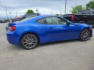 Check out this certified 2020 Subaru BRZ Sport-tech RS 6-Speed Manual, Brembo Brakes, Nav, Heated Seats, Rear Camera, Bluetooth, and more!. Its Manual transmission and 2.0 L engine will keep you going. . See it for yourself at Mark Wilsons Better Used Cars, 5055 Whitelaw Road, Guelph, ON N1H 6J4.60+ years of World Class Service!650+ Live Market Priced VEHICLES! ONE MASSIVE LOCATION!No unethical Penalties or tricks for paying cash!Free Local Delivery Available!FINANCING! - Better than bank rates! 6 Months No Payments available on approved credit OAC. Zero Down Available. We have expert licensed credit specialists to secure the best possible rate for you and keep you on budget ! We are your financing broker, let us do all the leg work on your behalf! Click the RED Apply for Financing button to the right to get started or drop in today!BAD CREDIT APPROVED HERE! - You dont need perfect credit to get a vehicle loan at Mark Wilsons Better Used Cars! We have a dedicated licensed team of credit rebuilding experts on hand to help you get the car of your dreams!WE LOVE TRADE-INS! - Top dollar trade-in values!SELL us your car even if you dont buy ours! HISTORY: Free Carfax report included.Certification included! No shady fees for safety!EXTENDED WARRANTY: Available30 DAY WARRANTY INCLUDED: 30 Days, or 3,000 km (mechanical items only). No Claim Limit (abuse not covered)5 Day Exchange Privilege! *(Some conditions apply)CASH PRICES SHOWN: Excluding HST and Licensing Fees.2019 - 2024 vehicles may be daily rentals. Please inquire with your Salesperson.