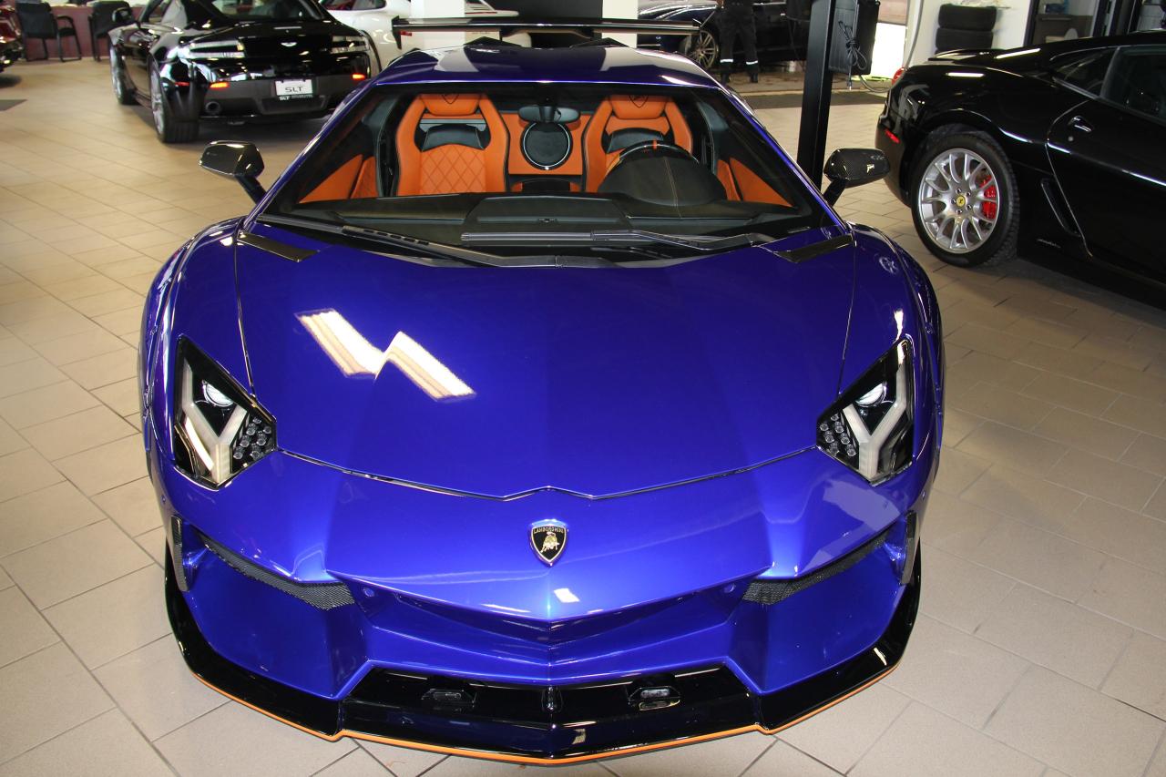 <p>2014 LAMBORGHINI AVENTADOR LP 700-4, PICTURES TELL THE STORY OF THIS RARE BEAUTIFUL RAGING BULL! GRIGIO TELESTO WRAPED IN ELECTRIC BLUE, WITH ORANGE INT, ORANGE ACCIENTS, CALIPERS AND WHEELS. FULL LIBERTY WALK CARBON FIBRE PACKAGE, ADJUSTABLE LEVEL RIDE SUSPENSION, WHEELS, FRONT AND REAR DIFFUSER, FULL CARBON FIBRE REAR WING....PLEASE CALL TO DISCUSS THIS AMAZING 1 OF A KIND VEHICLE! THANK YOU, VITO</p>