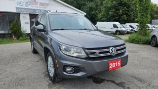 CLEAN CARFAX REPORT No Accidents<br><br>2015 VOLKSWAGEN TIGUAN R-line featuring Back up Camera, Cruise Control, Hand free phone, Panoramic Sunroof, Heated seats, Dual Air Conditioning, Tilt/Telescoping Steering Column, Leather/Metal-Look Steering Wheel, Alloy Wheels, Fixed Rear Window w/Fixed Interval Wiper and Defroster, Tinted Glass, Galvanized Steel Panels, Grille Chrome, Power Windows and more.<br><br>Purchase price: $12,888  plus HST and LICENSING<br><br>Safety package is available for $799 and includes Ontario Certification, 3 month or 3000 km Lubrico warranty ($1000 per claim) and oil change.<br>If not certified, by OMVIC regulations this vehicle is being sold AS-lS and is not represented as being in road worthy condition, mechanically sound or maintained at any guaranteed level of quality. The vehicle may not be fit for use as a means of transportation and may require substantial repairs at the purchaser   s expense. It may not be possible to register the vehicle to be driven in its current condition.<br><br>CARFAX PROVIDED FOR EVERY VEHICLE<br><br>WARRANTY: Extended warranty with variety terms and coverages is available, please ask our representative for more details.<br>FINANCING: Regardless of your credit score, we are committed to assisting you in obtaining a customized car loan that suits your specific circumstances. Our goal is to help you enhance your credit score significantly by the time you complete your loan term. Our specialists are happy to assist you with all necessary information.<br>TRADE-IN OR SELL: Upgrade your ride by trading-in your vehicle and save on taxes, or Sell it to us, and get the best value for your current vehicle.<br><br>Smart Wheels Used Car Dealership     OMVIC Registered Dealer<br>642 Dunlop St West, Barrie, ON L4N 9M5<br>Phone: 705-721-1341 ext 201<br>Email: Info@swcarsales.ca<br>Web: www.swcarsales.ca<br>Terms and conditions may apply. Price and availability subject to change. Contact us for the latest information<br>