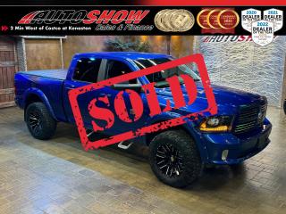 <strong>*** 4X4 BLUE STREAK PEARL RAM 1500 CREW CAB SPORT *** HEATED SEATS, HEATED STEERING WHEEL, ALPINE SPEAKERS W/SUBWOOFER!! *** 8.4 INCH TOUCHSCREEN, TONNEAU COVER, 20 INCH ALLOY RIMS!! *** </strong>Introducing the powerful 2017 Ram 1500! Dominate the road in this versatile and capable truck that is bult to handle anything you throw at it! With its spacious interior and seating for up to five passengers, this vehicle is perfect for hauling family and friends or all of your gear for a weekend adventure. The 4x4 capability allows you to conquer challenging terrain with ease, while the powerful engine ensures impressive performance and towing capability. This truck is equipped with features such as <strong>HEATED SEATS</strong>......<strong>HEATED STEERING WHEEL</strong>......<strong>8.4 INCH TOUCH SCREEN</strong>......Mesh Cloth Front Bucket Seats w/ Vinyl Bolsters......<strong>9 ALPINE SPEAKERS WITH SUBWOOFER</strong>......A/C w/ Dual-Zone Auto Temp Control......Rear Under Seat Compartment Storage......Rear Center Folding Arm Rest w/ Cupholders......Reverse Camera......Leather Wrapped Steering Wheel w/ Media and Cruise Control......<strong>5.7L HEMI V8 </strong>Engine......Automatic Transmission......<b>20 INCH ALLOY RIMS </b>w/ <strong>OPEN COUNTRY TIRES!!</strong><br /><br />This sporty truck comes with only <strong>76,500 KILOMETERS </strong>now on sale for only <strong>$35,999.00!! </strong>Financing and Extended Warranty available!!<br /><br /><br />Will accept trades. Please call <a href=\tel:(204)560-6287\>(204)560-6287</a> or View at 3165 McGillivray Blvd. (Conveniently located two minutes West from Costco at corner of Kenaston and McGillivray Blvd.)<br /><br />In addition to this please view our complete inventory of used <a href=\https://www.autoshowwinnipeg.com/used-trucks-winnipeg/\>trucks</a>, used <a href=\https://www.autoshowwinnipeg.com/used-cars-winnipeg/\>SUVs</a>, used <a href=\https://www.autoshowwinnipeg.com/used-cars-winnipeg/\>Vans</a>, used <a href=\https://www.autoshowwinnipeg.com/new-used-rvs-winnipeg/\>RVs</a>, and used <a href=\https://www.autoshowwinnipeg.com/used-cars-winnipeg/\>Cars</a> in Winnipeg on our website: <a href=\https://www.autoshowwinnipeg.com/\>WWW.AUTOSHOWWINNIPEG.COM</a><br /><br />Complete comprehensive warranty is available for this vehicle. Please ask for warranty option details. All advertised prices and payments plus taxes (where applicable).<br /><br />Winnipeg, MB - Manitoba Dealer Permit # 4908       <p>Sold to another happy customer</p>