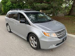 <div><em style=font-size: 1em; text-decoration: underline;><strong><span style=font-size: 1em;>2012 HONDA ODYSSEY TOURING-8 PASSENGER-1 LOCAL OWNER!! TOP OF THE LINE!! FULLY EQUIPPED!!</span></strong></em></div><p><em><strong>LOCAL ONTARIO VEHICLE</strong></em> (NOT FROM QUEBEC, OR UNITED STATES)!</p><p>HONDA DEALER SERVICED/MAINTAINED!! PLEASE REVIEW FREE CARFAX REPORT (LINK ATTACHED BELOW)</p><p><a href=vhr.carfax.ca/?id=YfxDYYNNb53HGt055L4XsOMOp7mDN0Tk>vhr.carfax.ca/?id=YfxDYYNNb53HGt055L4XsOMOp7mDN0Tk</a><br /><br />2012 HONDA ODYSSEY TOURING WITH LEATHER INTERIOR, PWR GLASS MOONROOF, GPS/NAVIGATION, HONDA FACTORY DVD PLAYER/ENTERTAINMENT CENTER</p><p>FULLY EQUIPPED*****LOADED WITH ALL OPTIONS*****BACK UP CAMERA, POWER DUAL SLIDING DOORS & REAR TAILGATE, BACK UP CAMERA/PARKING SENSORS, 6 CYLINDER ENGINE, AUTO. TRANS. HEATED POWER LEATHER SEATS, POWER GLASS MOON ROOF, DUAL AIR CONDITIONING WITH CLIMATE CONTROL (FRONT & REAR), CRUISE CONTROL, FOG LIGHTS, PREMIUM SOUND SYSTEM, ALLOY WHEELS, PM, PS, PB, PDL - KEY LESS ENTRY, AND MORE! TO MUCH TO LIST!!<em><strong>TOURING WITH GPS/NAVIGATION - 8 PASSENGER </strong></em>FULLY EQUIPPED MODEL<br /><br /><span style=text-decoration: underline;><em><strong>THE FOLLOWING FEATURES LISTED BELOW ARE ALL INCLUDED IN THE SELLING PRICE:</strong></em></span><br /><br />***VEHICLE HISTORY REPORT - CARFAX <br /><br />***ALL ORIGINAL MANUALS, BOOKS AND 2 KEYS INCLUDED</p><p><br />HST, LICENCE & OMVIC ($12.50) FEE EXTRA. </p><p>NO OTHER (HIDDEN) FEES EVER!</p><p>YOU CERTIFY AND YOU SAVE $$$ </p><p><span style=text-decoration: underline;><strong><em>AT THIS PRICE <em><strong>(</strong></em>NOT CERTIFIED-NOR HAS IT BEEN INSPECTED) - SOLD AS IS / AS TRADED-IN</em></strong></span><em>, </em>This vehicle is being sold “AS IS,” unfit, not e-tested and is not represented as being in road worthy condition, mechanically sound or maintained at any guaranteed level of quality. The vehicle may not be fit for use as a means of transportation and may require substantial repairs at the purchaser’s expense. It may not be possible to register the vehicle to be driven in its current condition.”</p><p>FEEL FREE TO BRING YOUR OWN PERSONAL TECHNICIAN ALONG TO INSPECT, AND TEST DRIVE, THIS VEHICLE <strong>PRIOR </strong>TO PURCHASING.</p><p>HST & LICENCE FEE EXTRA.<br /><br />NO OTHER (HIDDEN) FEES EVER!<br /><br />PLEASE CALL 416-274-AUTO (2886) TO SCHEDULE AN APPOINTMENT AND TO ENSURE AVAILABILITY.<br /><br />RICHSTONE FINE CARS INC.<br /><br />855 ALNESS STREET, UNIT 17<br />TORONTO, ONTARIO<br />M3J 2X3<br /><br />416-274-AUTO (2886)<br /><br />WE ARE AN OMVIC CERTIFIED (REGISTERED) DEALER AND PROUD MEMBER OF THE UCDA.<br /><br />SERVING TORONTO, GTA AND CANADA SINCE 2000!!<br /><br />WE CAN ALSO ASSIST IN OUT OF PROVINCE PURCHASES, AS WELL.<br /><br /><span style=text-decoration: underline;><em><strong>VEHICLE OPTIONS:</strong></em></span><br /><br /><strong>GPS/NAVIGATION</strong></p><p><strong>BACK UP CAMERA</strong></p><p><strong>POWER TAILGATE & DUAL POWER SLIDING DOORS</strong></p><p><strong>POWER GLASS MOON ROOF</strong></p><p>DVD PLAYER/SCREEN</p><p>HEATED POWER SEATS WITH MEMORY SETTINGS       </p><p>HONDA DEALER SERVICED/MAINTAINED                                                                                                                                                  <strong> </strong>                                                                                                                                                                                                      PREMIUM SOUND SYSTEM<br />KEYLESS ENTRY <br />LEATHER INTERIOR WITH HEATED POWER SEATS<br />POWER GLASS MOON ROOF<br />Power locks<br />Power mirrors<br />Power steering<br />Power trunk<br />Remote keyless entry<br />Tilt wheel<br />Power windows<br />Rear window defroster<br />Rear window wiper<br />Tinted glass<br />CD player<br />Premium audio<br />Satellite radio<br />Bucket seats<br />Bluetooth<br />Heated-power seats<br />Leather seats***Power seats with memory settings<br />Third row seating<br />Airbag: driver<br />Alarm<br />Anti-lock brakes<br />Backup sensor<br />Fog lights<br />Traction control</p><p> </p><div><p> </p></div>