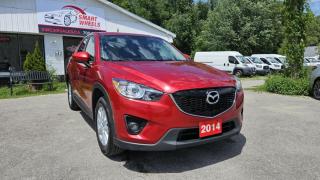 CLEAN CARFAX REPORT No Accidents<br><br>2014 MAZDA CX-5 TOURING featuring Air Conditioning, Alloy Wheels, Backup Camera, Cruise Control, Heated Seats, Keyless Entry, Power Seats, Power Windows, Sunroof / Moonroof and more<br><br>Purchase price: $13,388 plus HST and LICENSING<br><br>Safety package is available for $799 and includes Ontario Certification, 3 month or 3000 km Lubrico warranty ($1000 per claim) and oil change.<br>If not certified, by OMVIC regulations this vehicle is being sold AS-lS and is not represented as being in road worthy condition, mechanically sound or maintained at any guaranteed level of quality. The vehicle may not be fit for use as a means of transportation and may require substantial repairs at the purchaser   s expense. It may not be possible to register the vehicle to be driven in its current condition.<br><br>CARFAX PROVIDED FOR EVERY VEHICLE<br><br>WARRANTY: Extended warranty with variety terms and coverages is available, please ask our representative for more details.<br>FINANCING: Regardless of your credit score, we are committed to assisting you in obtaining a customized car loan that suits your specific circumstances. Our goal is to help you enhance your credit score significantly by the time you complete your loan term. Our specialists are happy to assist you with all necessary information.<br>TRADE-IN OR SELL: Upgrade your ride by trading-in your vehicle and save on taxes, or Sell it to us, and get the best value for your current vehicle.<br><br>Smart Wheels Used Car Dealership     OMVIC Registered Dealer<br>642 Dunlop St West, Barrie, ON L4N 9M5<br>Phone: 705-721-1341 ext 201<br>Email: Info@swcarsales.ca<br>Web: www.swcarsales.ca<br>Terms and conditions may apply. Price and availability subject to change. Contact us for the latest information<br>