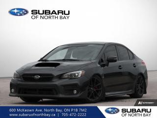<p>Step into the world of thrilling performance with the 2018 Subaru WRX Sport-Tech. This sleek black sedan</p>
<p> and advanced technology in this exceptional vehicle.

FEATURES OF THE WRX Sport-Tech
--> Sport-tuned suspension for agile handling
--> Premium leather upholstery for added comfort
--> Harman Kardon audio system for superior sound
--> Sunroof for an open-air driving experience

ADVANCED SAFETY FEATURES
--> Blind-spot detection for safer lane changes
--> Rear cross-traffic alert for parking ease
--> High-beam assist for better night visibility
--> Subaru EyeSight driver assist technology

PERFORMANCE AND EFFICIENCY
--> 2.0L turbocharged engine for powerful drives
--> Symmetrical all-wheel drive for better traction
--> Six-speed manual transmission for control
--> Fuel-efficient design for longer trips

COMFORT AND CONVENIENCE
--> Heated front seats for cold weather comfort
--> Dual-zone automatic climate control
--> Keyless entry and push-button start
--> Spacious interior for passenger comfort

TECHNOLOGY AND CONNECTIVITY
--> 7-inch touchscreen infotainment system
--> Navigation system for easy guidance
--> Apple CarPlay and Android Auto integration
--> Bluetooth hands-free connectivity

CARGO SPACE
--> 340 litres of trunk space
--> Rear seat pass-through for longer items
--> Ample storage compartments
--> Foldable rear seats for extra room

AWARDS & RECOGNITIONS
--> Top Safety Pick by Insurance Institute for Highway Safety</p>
<p> 2018

WHAT OTHER OWNERS LIKE
--> Responsive and powerful engine
--> Advanced safety features
--> Comfortable and luxurious interior
--> Excellent all-wheel drive performance

This 2018 Subaru WRX Sport-Techs VIN is: JF1VA1K65J9813900.</p>
<a href=http://www.subaruofnorthbay.ca/used/Subaru-WRX-2018-id10927537.html>http://www.subaruofnorthbay.ca/used/Subaru-WRX-2018-id10927537.html</a>