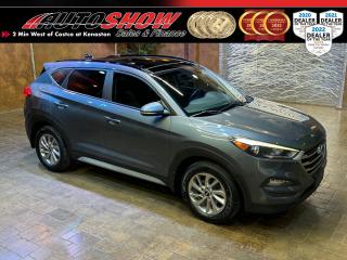 <strong>*** COLISEUM GRAY HYUNDAI TUCSON SE *** HEATED SEATS, HEATED STEERING WHEEL, SUNROOF *** LEATHER INTERIOR,  7.0 INCH TOUCHSCREEN, BLIND SPOT MONITORING, 17 INCH ALLOY RIMS *** </strong>Discover the perfect companion for your adventures with the Hyundai Tucson! This versatile compact SUV combines modern style with robust performance, ensuring every ride is a delight. Enjoy a roomy, comfortable interior packed with features such as <strong>HEATED SEATS</strong>......<strong>HEATED STEERING WHEEL</strong>......<strong>SUNROOF</strong>......<strong>LEATHER INTERIOR</strong>......7.0 inch Touchscreen......<strong>BLIND SPOT MONITORING</strong>......Bluetooth......Leather Wrapped Steering Wheel w/ Media and Cruise Control......Reverse Camera......<strong>2.0L I4 </strong>Engine......Automatic Transmission......<strong>17 INCH ALLOY RIMS </strong>w/ <strong>ANTARES TIRES</strong>!!<br /><br />This vehicle comes with only <strong>108,500 KILOMETERS </strong>and original Books and Manuals!! Financing and Extended Warranty Available!!<br /><br /><br />Will accept trades. Please call (204)560-6287 or View at 3165 McGillivray Blvd. (Conveniently located two minutes West from Costco at corner of Kenaston and McGillivray Blvd.)<br /><br />In addition to this please view our complete inventory of used <a href=\https://www.autoshowwinnipeg.com/used-trucks-winnipeg/\>trucks</a>, used <a href=\https://www.autoshowwinnipeg.com/used-cars-winnipeg/\>SUVs</a>, used <a href=\https://www.autoshowwinnipeg.com/used-cars-winnipeg/\>Vans</a>, used <a href=\https://www.autoshowwinnipeg.com/new-used-rvs-winnipeg/\>RVs</a>, and used <a href=\https://www.autoshowwinnipeg.com/used-cars-winnipeg/\>Cars</a> in Winnipeg on our website: <a href=\https://www.autoshowwinnipeg.com/\>WWW.AUTOSHOWWINNIPEG.COM</a><br /><br />Complete comprehensive warranty is available for this vehicle. Please ask for warranty option details. All advertised prices and payments plus taxes (where applicable).<br /><br />Winnipeg, MB - Manitoba Dealer Permit # 4908