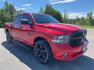 <b>Remote Start, Heated Seats, Power Driver Seat, Running Boards, Tonneau Cover, Ram Box (Compartment) Accident Free on Carfax Report, Local Trade not a Rental, Non-Smoker, Fresh Oil Change, Low Mileage!<br> <br></b><br>   Compare at $47835 - Kia of Timmins is just $45995! <br> <br>   Reliable, dependable, and innovative, this Ram 1500 Classic proves that it has what it takes to get the job done right. This  2022 Ram 1500 Classic is fresh on our lot in Timmins. <br> <br>The reasons why this Ram 1500 Classic stands above its well-respected competition are evident: uncompromising capability, proven commitment to safety and security, and state-of-the-art technology. From its muscular exterior to the well-trimmed interior, this 2022 Ram 1500 Classic is more than just a workhorse. Get the job done in comfort and style while getting a great value with this amazing full size truck. This low mileage  Crew Cab 4X4 pickup  has just 18,103 kms. Its  red in colour  . It has a 8 speed automatic transmission and is powered by a  395HP 5.7L 8 Cylinder Engine. <br> <br> Our 1500 Classics trim level is Express. Upgrading to this rugged 1500 Classic Express is a great choice as it comes loaded with stylish aluminum wheels, body colored bumpers, front fog lights, heavy-duty shock absorbers, electronic stability control and trailer sway control. Additional features include ParkView rear back-up camera, cruise control, air conditioning, an infotainment hub with SiriusXM, radio 3.0 and a USB port, automatic headlights, power windows, power doors, and more. This vehicle has been upgraded with the following features: Air, Rear Air, Tilt, Cruise, Power Windows, Power Locks, Power Mirrors. <br> To view the original window sticker for this vehicle view this <a href=http://www.chrysler.com/hostd/windowsticker/getWindowStickerPdf.do?vin=1C6RR7KT5NS148466 target=_blank>http://www.chrysler.com/hostd/windowsticker/getWindowStickerPdf.do?vin=1C6RR7KT5NS148466</a>. <br/><br> <br>To apply right now for financing use this link : <a href=https://www.kiaoftimmins.com/timmins-ontario-car-loan-application target=_blank>https://www.kiaoftimmins.com/timmins-ontario-car-loan-application</a><br><br> <br/><br> Buy this vehicle now for the lowest bi-weekly payment of <b>$340.95</b> with $0 down for 84 months @ 8.99% APR O.A.C. ( Plus applicable taxes -  Plus applicable fees   / Total Obligation of $62052  ).  See dealer for details. <br> <br>As a local, family owned and operated dealership we look to be your number one place to buy your new vehicle! Kia of Timmins has been serving a large community across northern Ontario since 2001 and focuses highly on customer satisfaction. Our #1 priority is to make you feel at home as soon as you step foot in our dealership. Family owned and operated, our business is in Timmins, Ontario the city with the heart of gold. Also positioned near many towns in which we service such as: South Porcupine, Porcupine, Gogama, Foleyet, Chapleau, Wawa, Hearst, Mattice, Kapuskasing, Moonbeam, Fauquier, Smooth Rock Falls, Moosonee, Moose Factory, Fort Albany, Kashechewan, Abitibi Canyon, Cochrane, Iroquois falls, Matheson, Ramore, Kenogami, Kirkland Lake, Englehart, Elk Lake, Earlton, New Liskeard, Temiskaming Shores and many more.We have a fresh selection of new & used vehicles for sale for you to choose from. If we dont have what you need, we can find it! All makes and models are within our reach including: Dodge, Chrysler, Jeep, Ram, Chevrolet, GMC, Ford, Honda, Toyota, Hyundai, Mitsubishi, Nissan, Lincoln, Mazda, Subaru, Volkswagen, Mini-vans, Trucks and SUVs.<br><br>We are located at 1285 Riverside Drive, Timmins, Ontario. Too far way? We deliver anywhere in Ontario and Quebec!<br><br>Come in for a visit, call 1-800-661-6907 to book a test drive or visit <a href=https://www.kiaoftimmins.com>www.kiaoftimmins.com</a> for complete details. All prices are plus HST and Licensing.<br><br>We look forward to helping you with all your automotive needs!<br> o~o