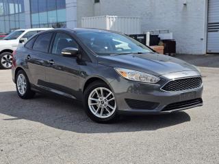 Experience performance, comfort and advanced technology with the 2017 Ford Focus SE, a versatile compact car designed to enhance your driving experience. Powered by a 2.0L engine paired with a 6-speed transmission, this vehicle offers both power and efficiency. Features include dual power heated folding mirrors, remote keyless entry, reverse camera, SYNC voice-activated system, cruise control, heated seats and heated steering wheel.<br>
<br>

Key Features:<br>
<br>

2.0L Engine: Combines power and efficiency.<br>
6-Speed Transmission: Smooth and responsive shifting.<br>
Dual Power Heated Folding Mirrors: Improved visibility and easy adjustments.<br>
SYNC Voice-Activated System: Easy access to navigation, entertainment, and communication.<br>
Remote Keyless Entry: Convenience at your fingertips.<br>
Cruise Control: Comfortable long drives.<br>
Reverse Camera: Assists with parking and reversing.<br>
Heated Seats: Warmth and comfort in cold weather.<br>
Heated Steering Wheel: Additional warmth for your hands in winter.<br>