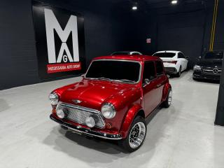 <p><strong>FOR SALE: 1995 Rover Mini Austin Automatic with AC </strong><strong>Professionally Restored All Original Right Hand Drive.</strong> </p><p><strong>Mississauga Auto Group Presents </strong></p><p><strong>Vintage Charm Meets Modern Comfort!</strong></p><p><strong>Features:</strong></p><ul><li><strong>Year:</strong> 1995</li><li><strong>Model:</strong> Rover Mini Austin Automatic</li><li><strong>Mileage:</strong> Only 53,000 kms</li><li><strong>Transmission:</strong> Automatic</li><li><strong>Drive:</strong> Right-Hand Drive</li><li><strong>Air Conditioning:</strong> Yes, enjoy comfort in every season!</li><li>Alloy Rims & Performance Tires</li><li>Sound System with ambient lighting </li><li>Tinted Windows </li></ul><p><strong>Why Youll Love This Mini:</strong></p><ul><li><strong>Fully Restored:</strong> Experience the joy of driving a classic car that looks and feels brand new.</li><li><strong>Iconic Design:</strong> Timeless style and British charm.</li><li><strong>Perfect for Enthusiasts:</strong> Own a piece of automotive history with all the modern amenities.</li><li><strong>Compact & Convenient:</strong> Ideal for city driving and tight parking spots.</li></ul><p><strong>Dont Miss Out!</strong> This fully restored 1995 Rover Mini Austin Automatic is a rare find, combining classic aesthetics with contemporary comfort. Ready to turn heads and offer a delightful driving experience.</p><p><strong>Inspected & Certified by Mississauga Auto Group</strong> 🏷️ <strong>Competitive Pricing</strong> 📞 <strong>Contact Us Today to Schedule a Test Drive!</strong></p><p>📍 <strong>Mississauga Auto Group</strong> 📞 <strong>Call us at (905) 808-1198</strong></p><p>🌐 <strong>Visit our website: <a href=http://www.mississaugaautogroup.com target=_new rel=noreferrer>www.mississaugaautogroup.com</a></strong></p><p>Drive away in a classic with confidence. Your dream car awaits! 🚗✨</p>